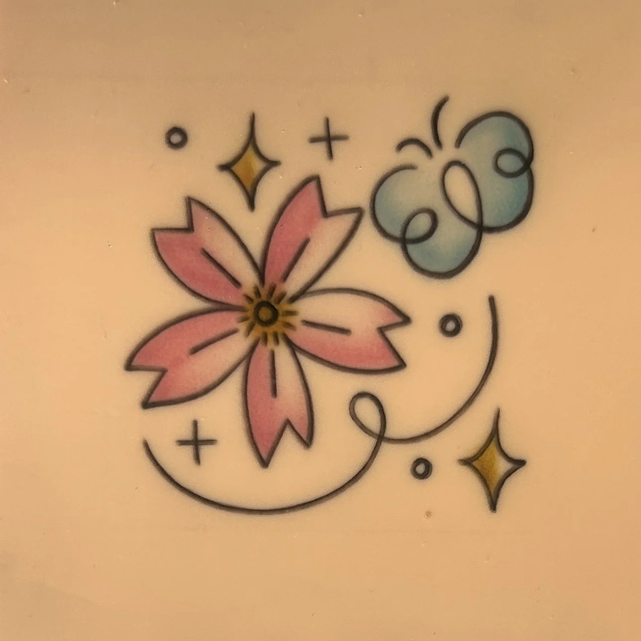 Flower Buttefly Tatt.jpg