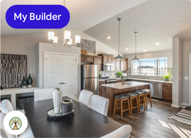 Open-concept kitchen and dining area with a dark dining table, white chairs, a kitchen island with barstools, stainless steel appliances, wooden cabinetry, pendant lights, and large window with a view.