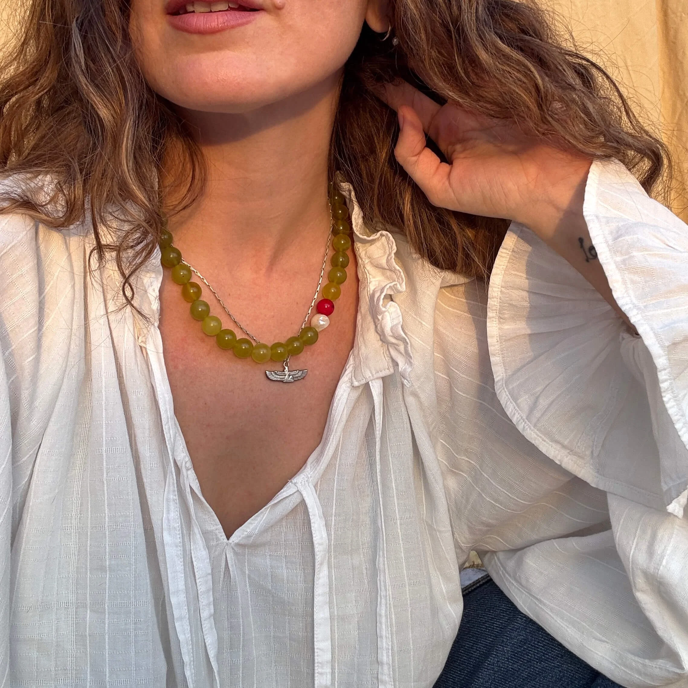 wearing rebirth amulet at home eros python.jpg