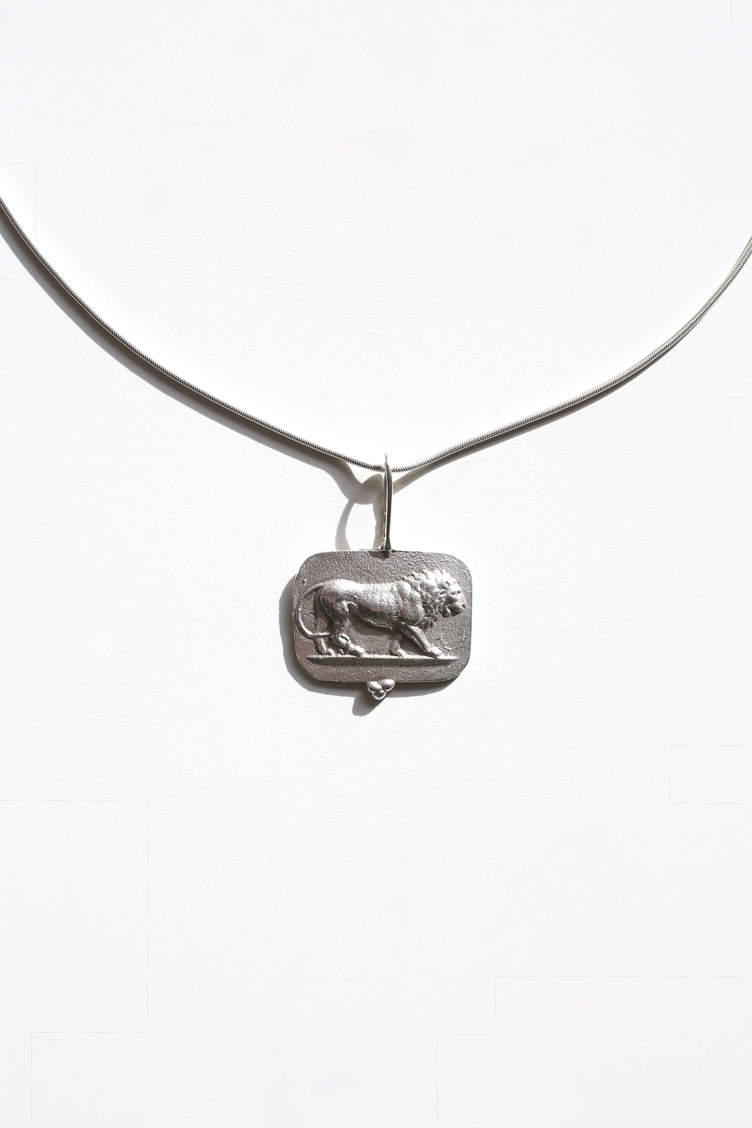 Eros Python Leon amuleto .jpg