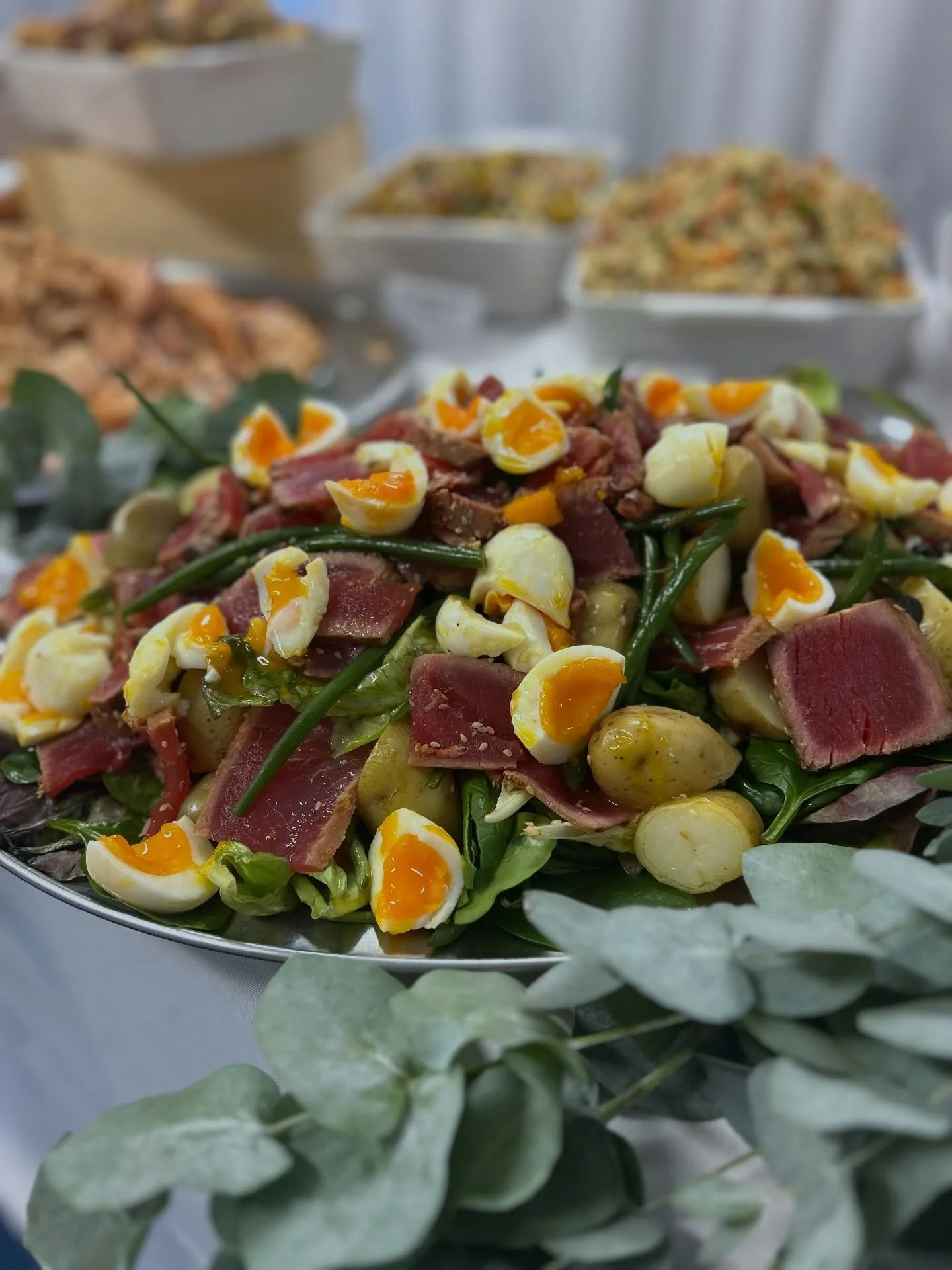 Dish of the day 🤌🏼 A little peek at part of today&rsquo;s set up and this tuna nicoise was such a hit with the guests ~ lightly seared tuna with Sussex new potatoes, fine green beans and the jammiest golden eggs. I&rsquo;m obsessed 😍 
#tunanicoise