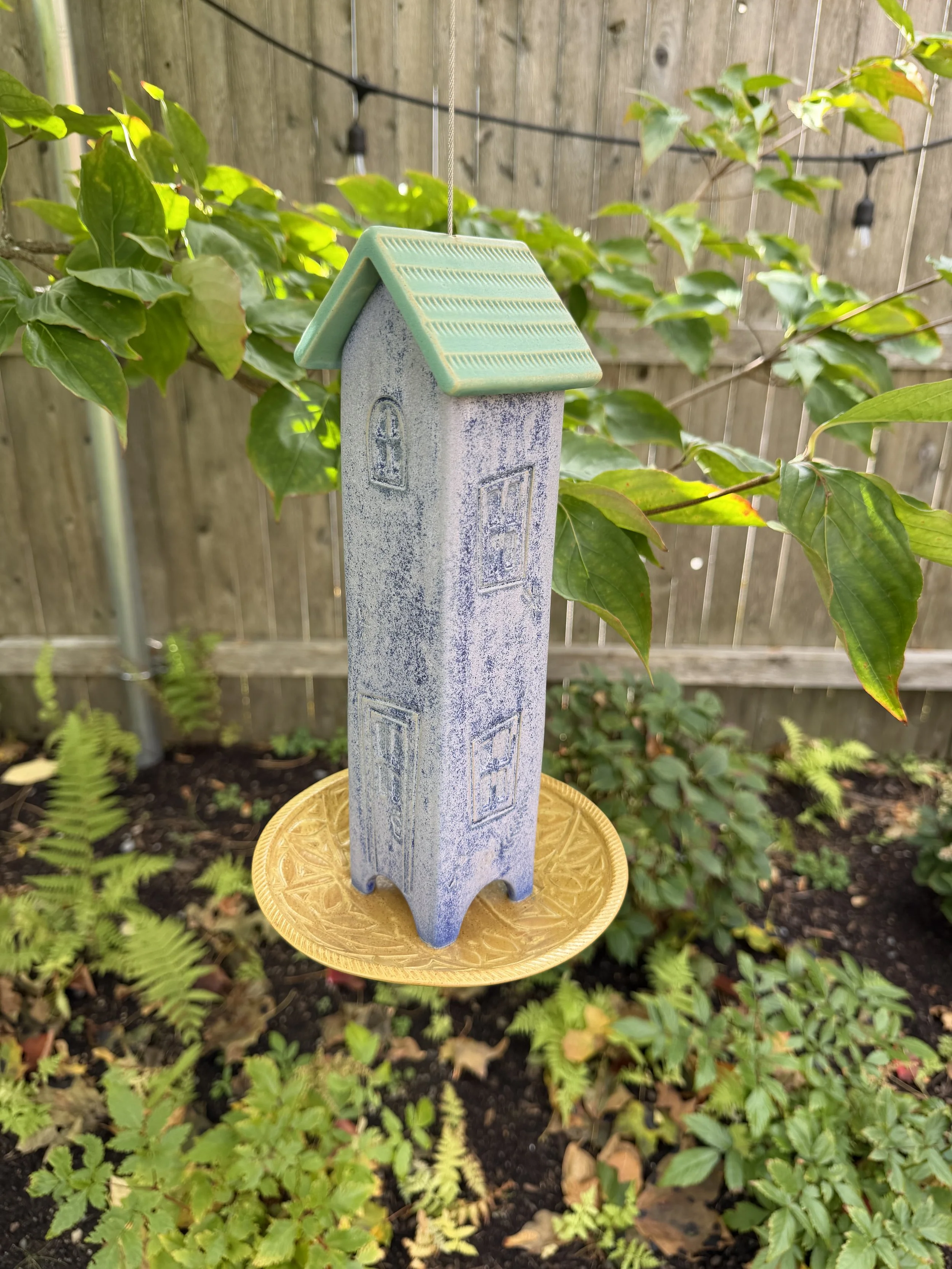 purple birdhouse .jpeg