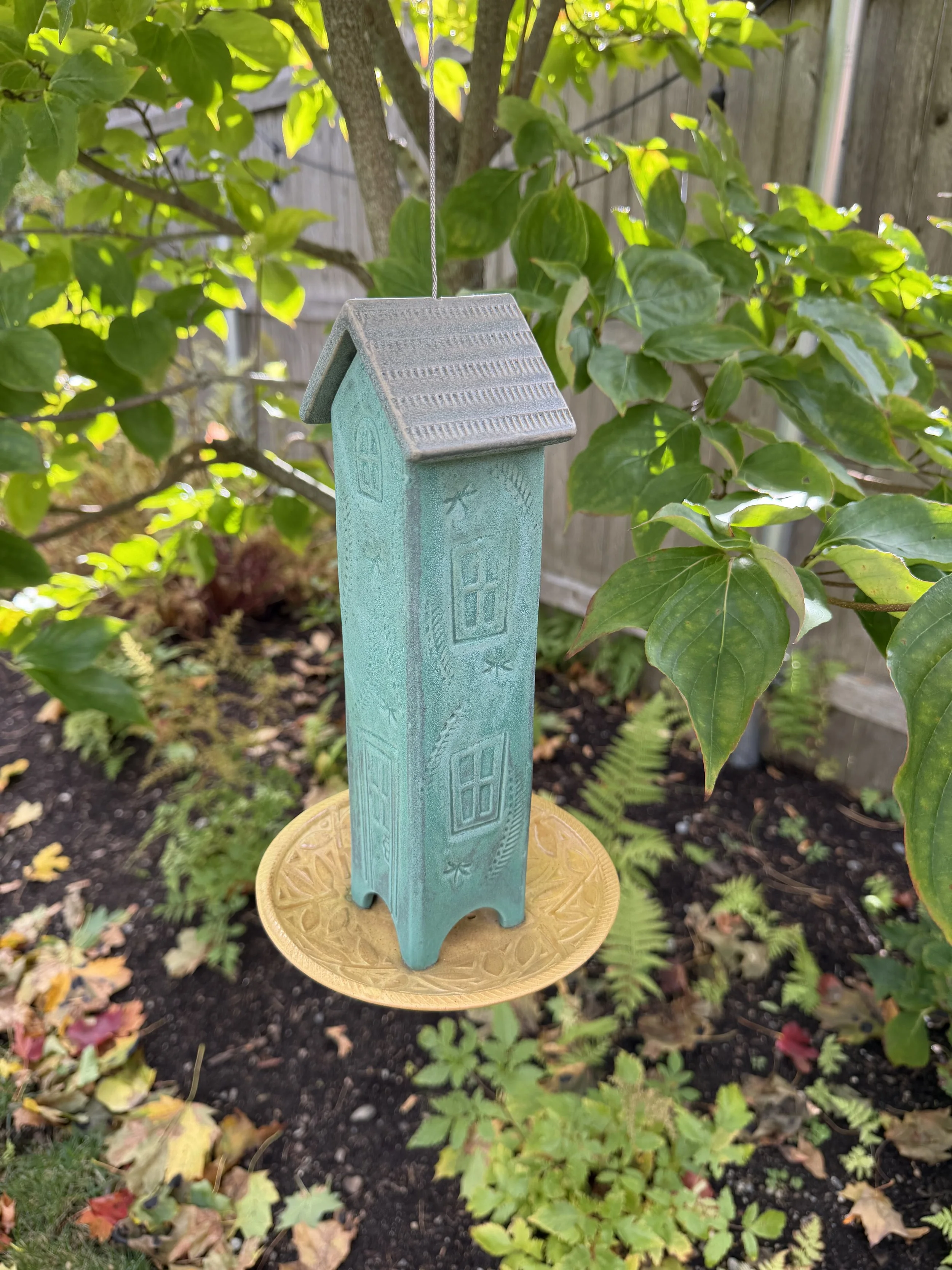 green birdhouse .jpeg
