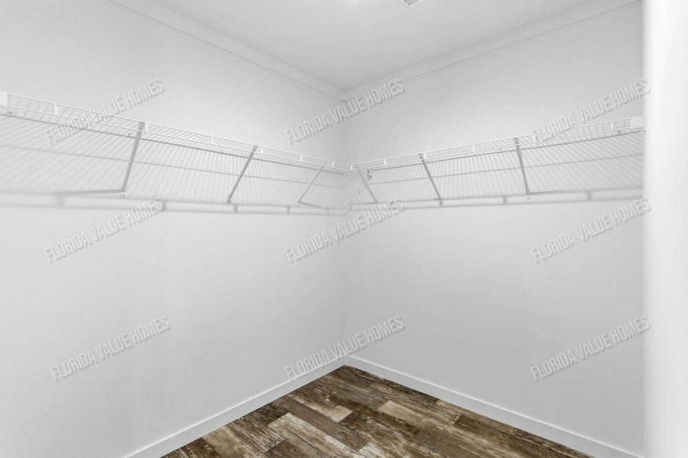 Gibbon-Tharp-239-key-largo-2856h32a1c-primary-closet.jpg
