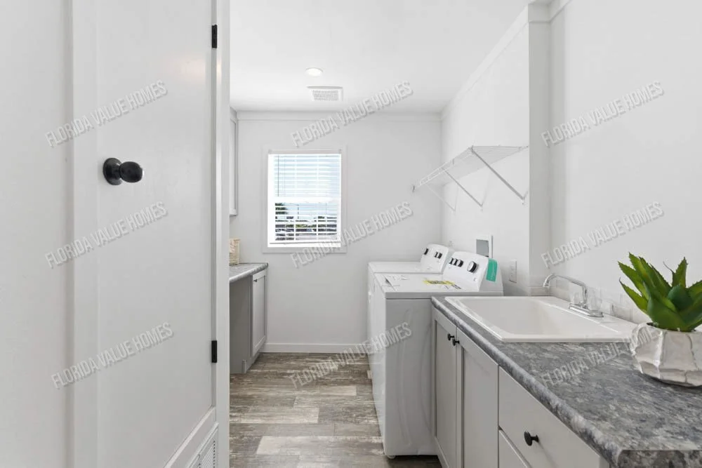 Gibbon-Tharp-239-key-largo-2856h32a1c-utility-room.jpg