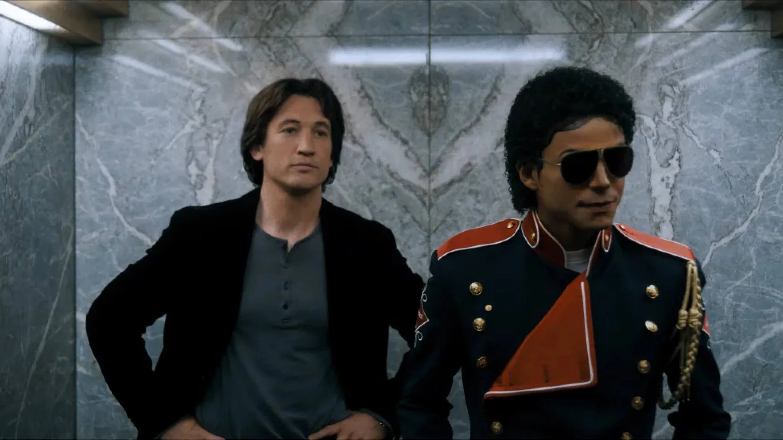 Michael Jackson and entertainment lawyer John Branca in an elevator scene from the 2025 Michael biopic, at the moment of a defining career decision.