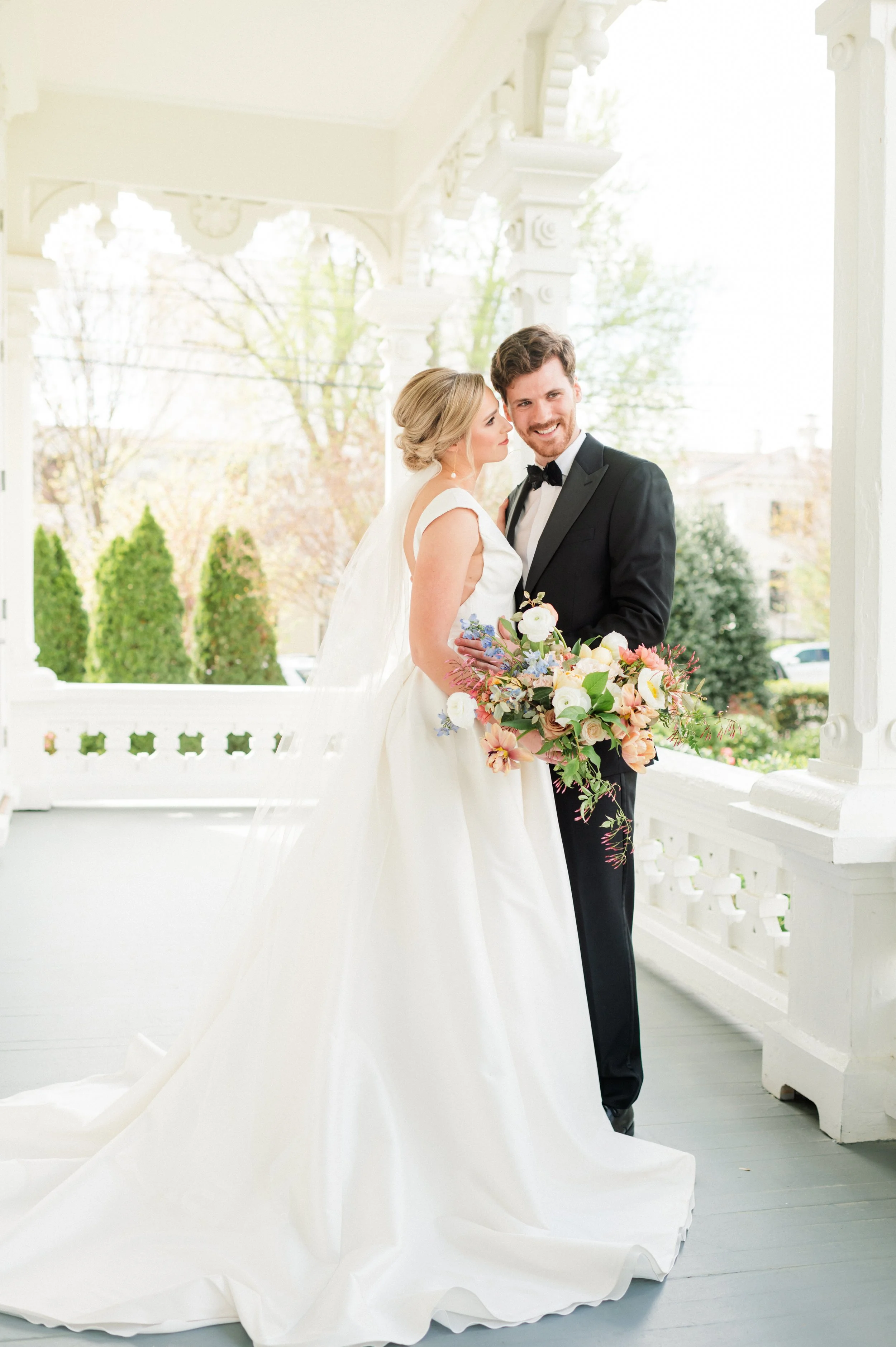 Bride and groom on their wedding day at the Merrimon-wynne house in raleigh nc