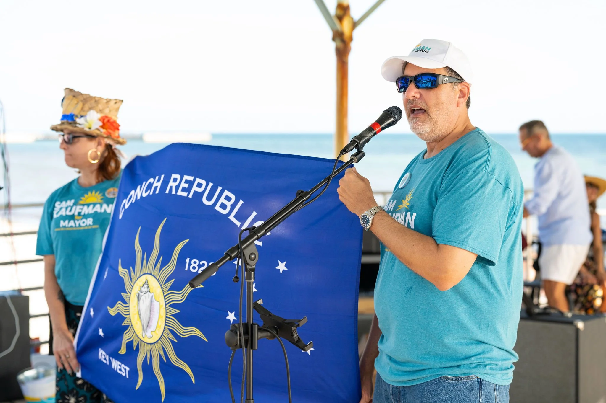 Sam Kaufman speaking at an event at Higgs Beach