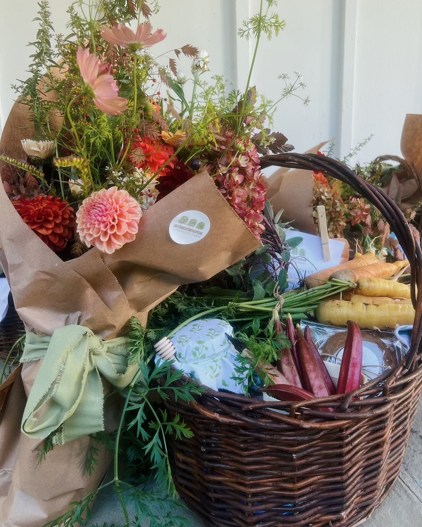 A basket by the door - beautiful, bountiful, bursting! #longfieldfarmct #cuttinggarden #kitchengarden #slowflowers #freshproduce #basket #hamper  #lfseasonalbasket #farmbasket #harvest #local #localflowers #flowersfromthefarm #dahlia