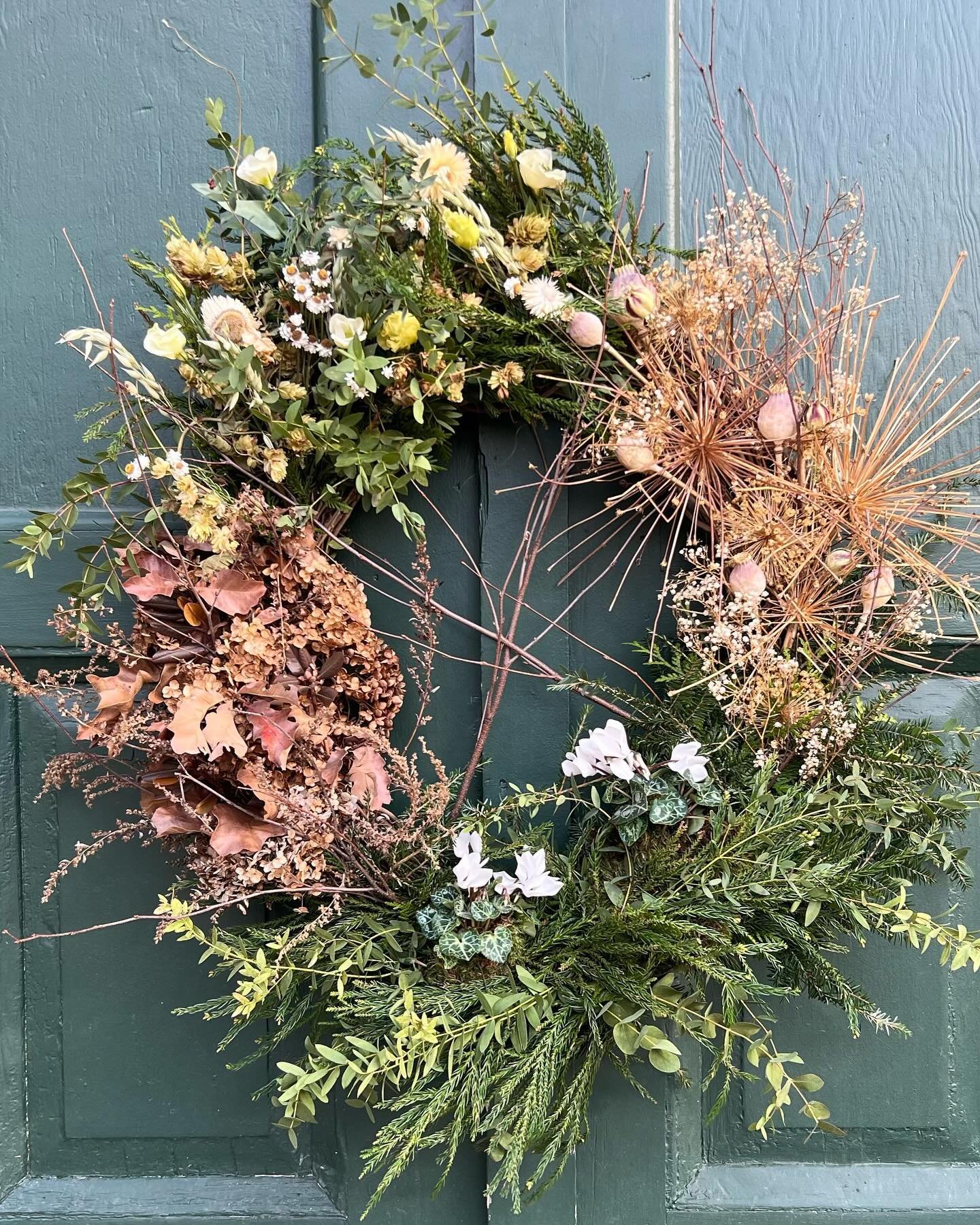 From garden to gallery. A wreath of four seasons - blooms from spring, summer, fall and winter - for &lsquo;Deck The Walls&rsquo; at New Canaan&rsquo;s @carriagebarnartscenter. Bidding is live on their website now and open through Thursday December 5