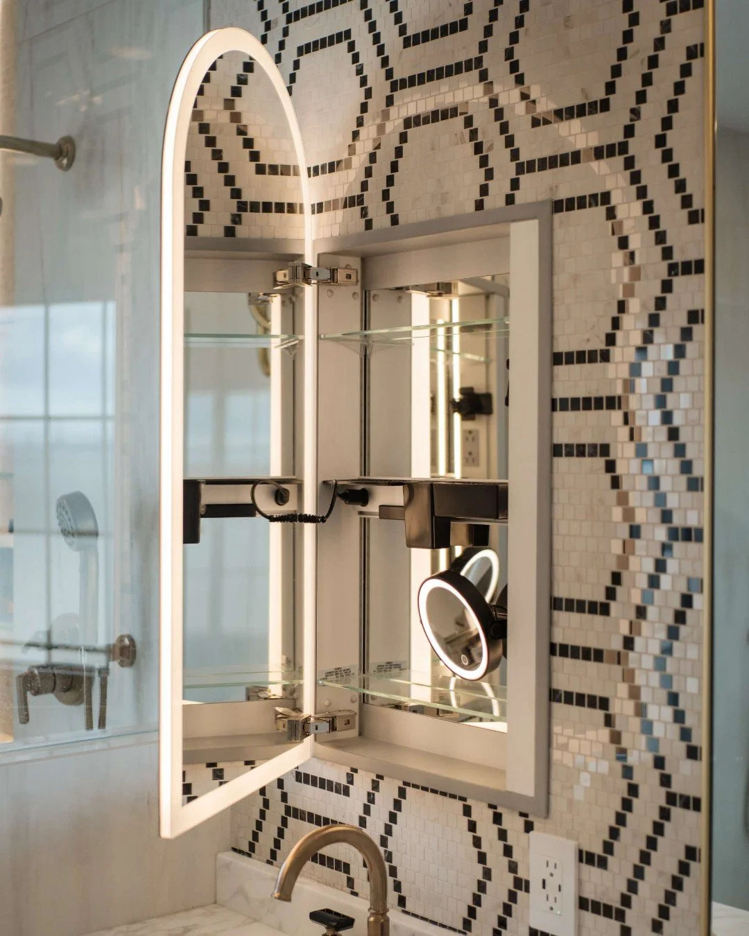 A space this thoughtfully designed makes your daily routine feel a little more luxurious. ✨

The Arched Presence Medicine Cabinet from Robern blends seamless design with modern functionality &mdash; warm, ambient lighting wraps around every angle, wh