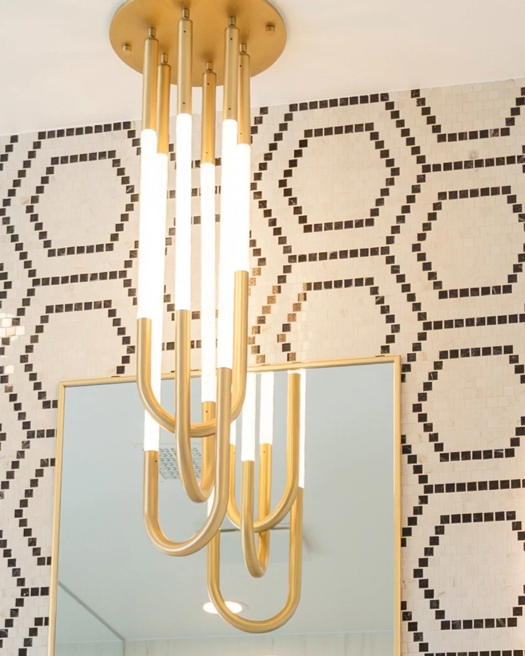 Shining a little extra in the season of sparkle ✨ &mdash; we&rsquo;re thrilled to highlight the Capsule Pendant by Luke Lamp Co. that we recently installed in this primary bathroom.

Luke Lamp Co. is known for their sculptural, rope-wrapped lighting,