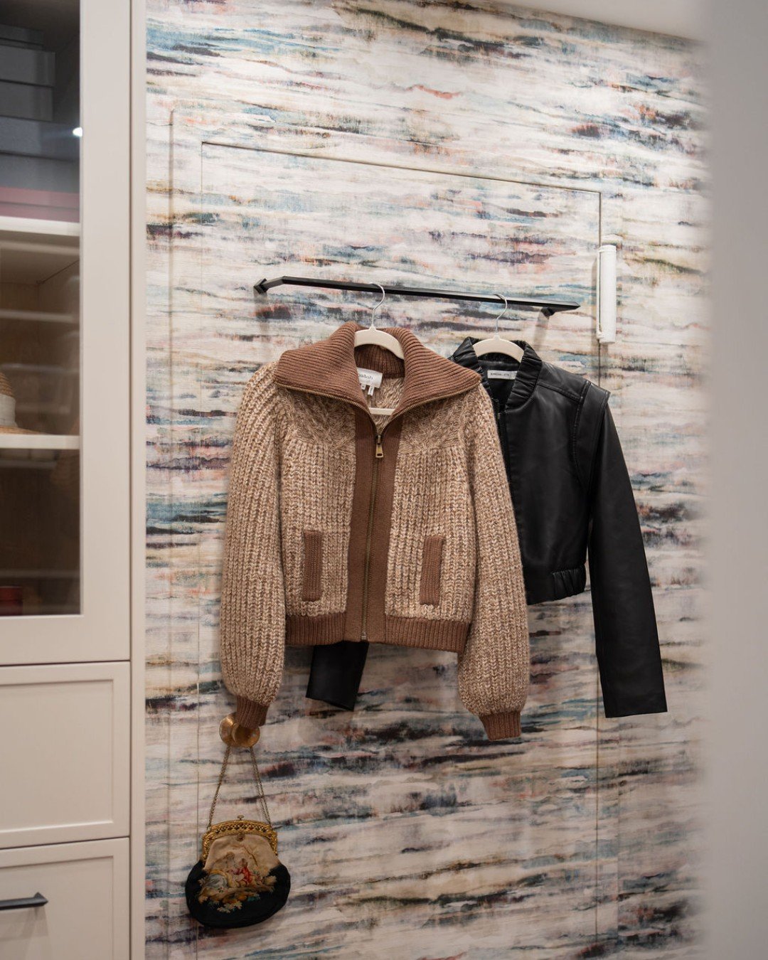 Sometimes it&rsquo;s the little details that make a big impact! Wallpapering the inside of a walk in closet door instantly elevates the space, while a styling rod adds both function and flair&mdash;perfect for planning tomorrow&rsquo;s outfit or show