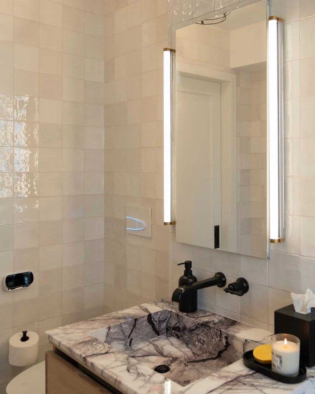 Sometimes the best design move is knowing when to let a statement breathe 🤍

These polished white tiles keep the space feeling light and clean, giving the Lilac Marble room to shine without competition. The mix of bold stone and simple finishes crea