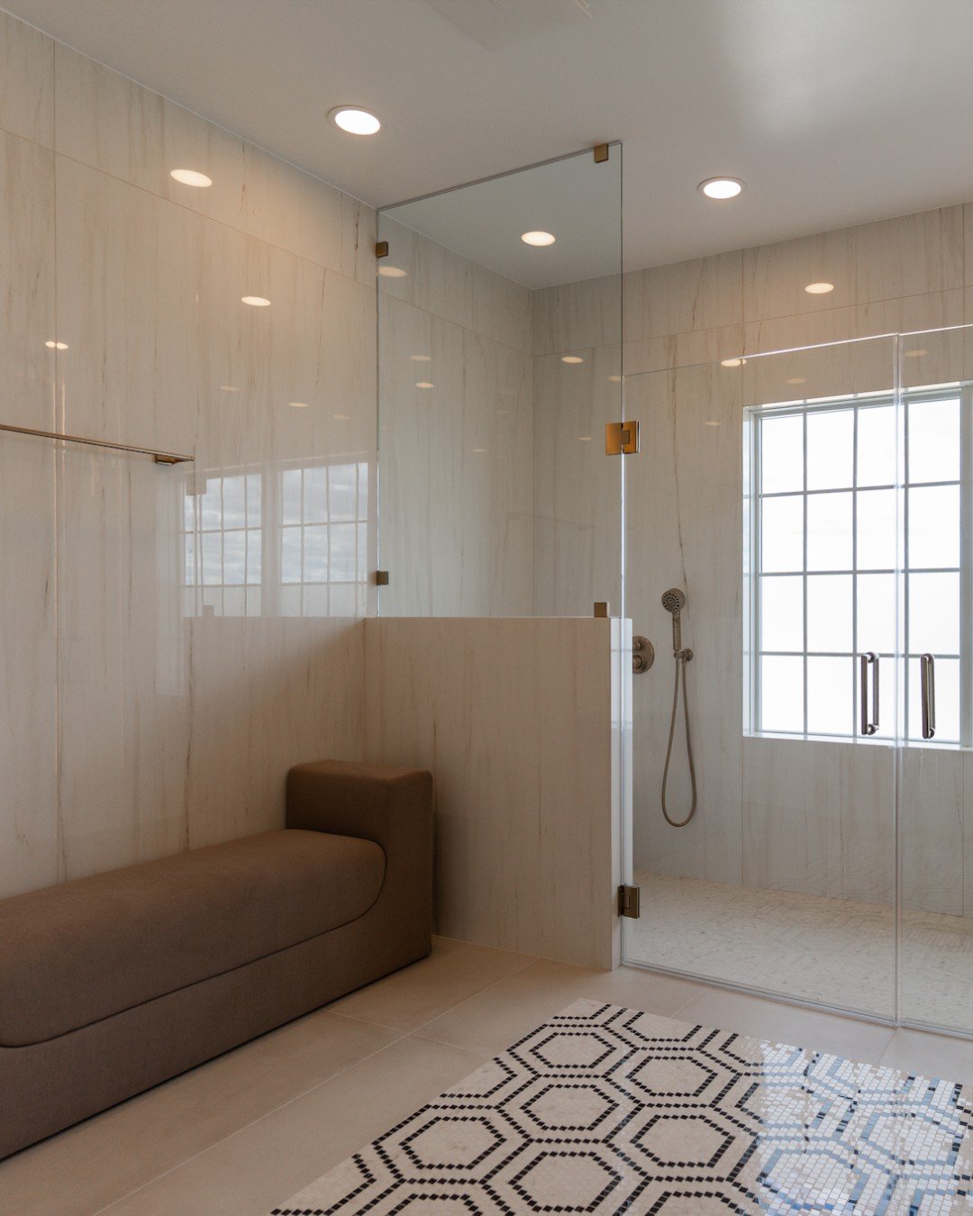 Luxury meets coastal calm. 🌊✨

Porcelain slabs wraps the bathroom and shower walls in large-format elegance, minimizing grout lines for a seamless, sophisticated backdrop. Its soft veining and subtle texture keep the space serene, letting the bold h