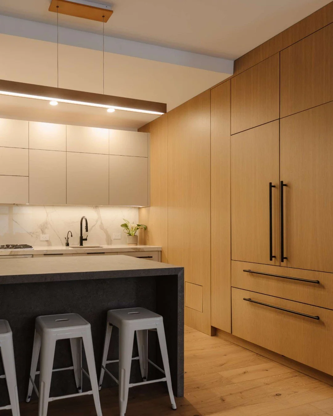 Why choose one cabinet finish&mdash;or one countertop&mdash;when you can thoughtfully combine two?

In many of our kitchen designs, we use two-tone cabinetry as a way to visually &ldquo;zone&rdquo; the space or to make certain moments feel more like 