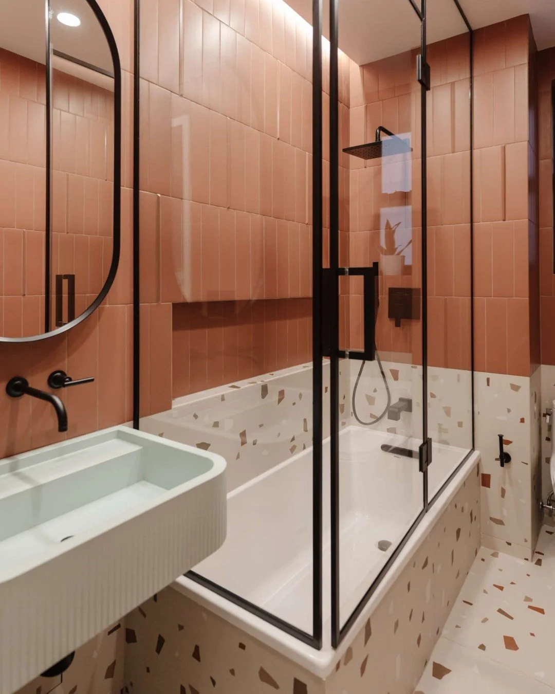 We believe kids&rsquo; spaces deserve the same level of design as every other room ✨

In this kids' bathroom, we embraced bold color while keeping the palette grounded&mdash;warm terracotta tile, earthy terrazzo, and clean-lined black accents for bal