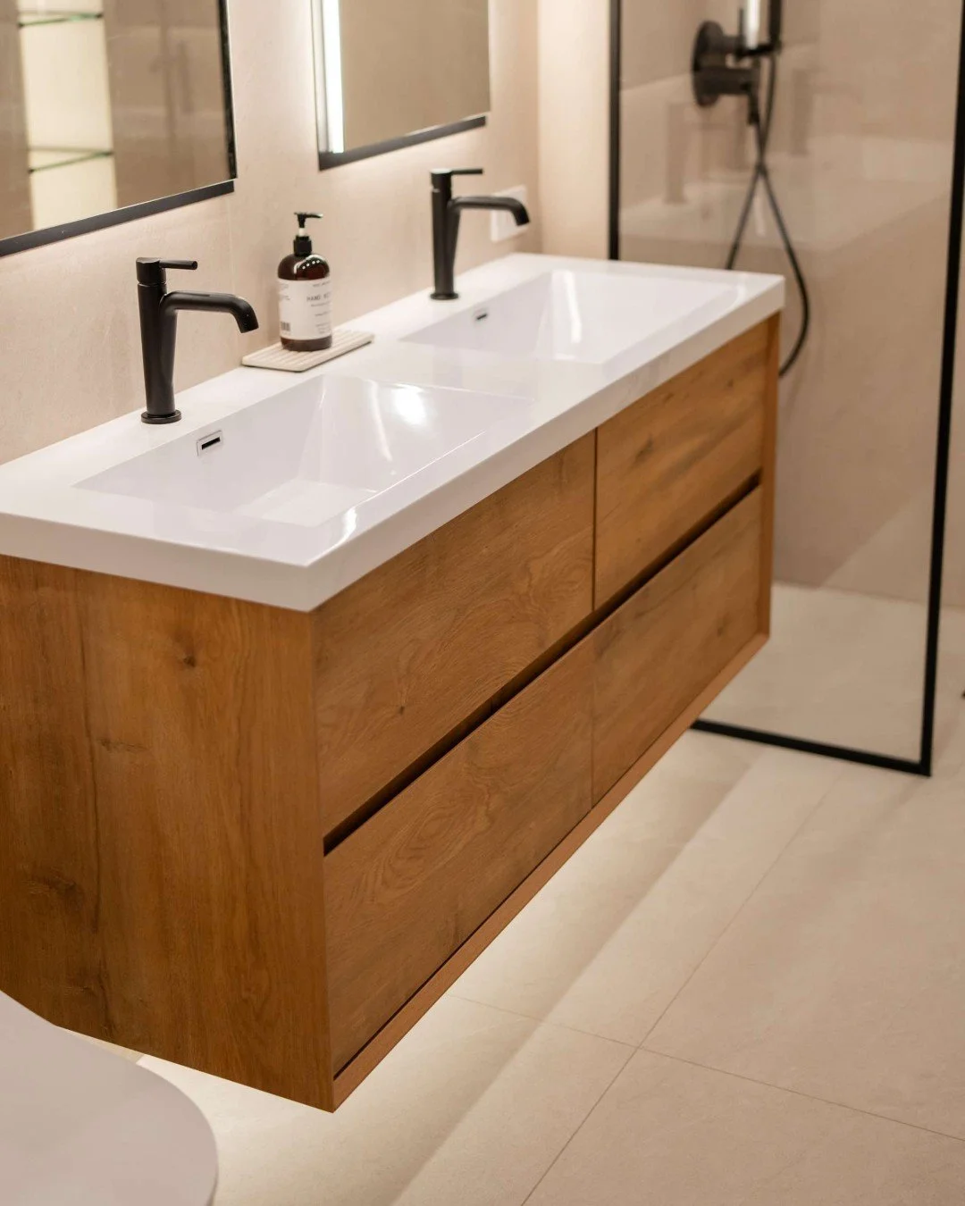 We&rsquo;re often asked how to achieve a custom look without starting from scratch&mdash;and this vanity is a perfect example.

Here, we took a store-bought vanity and elevated it through thoughtful design decisions. The foundation was strong: integr