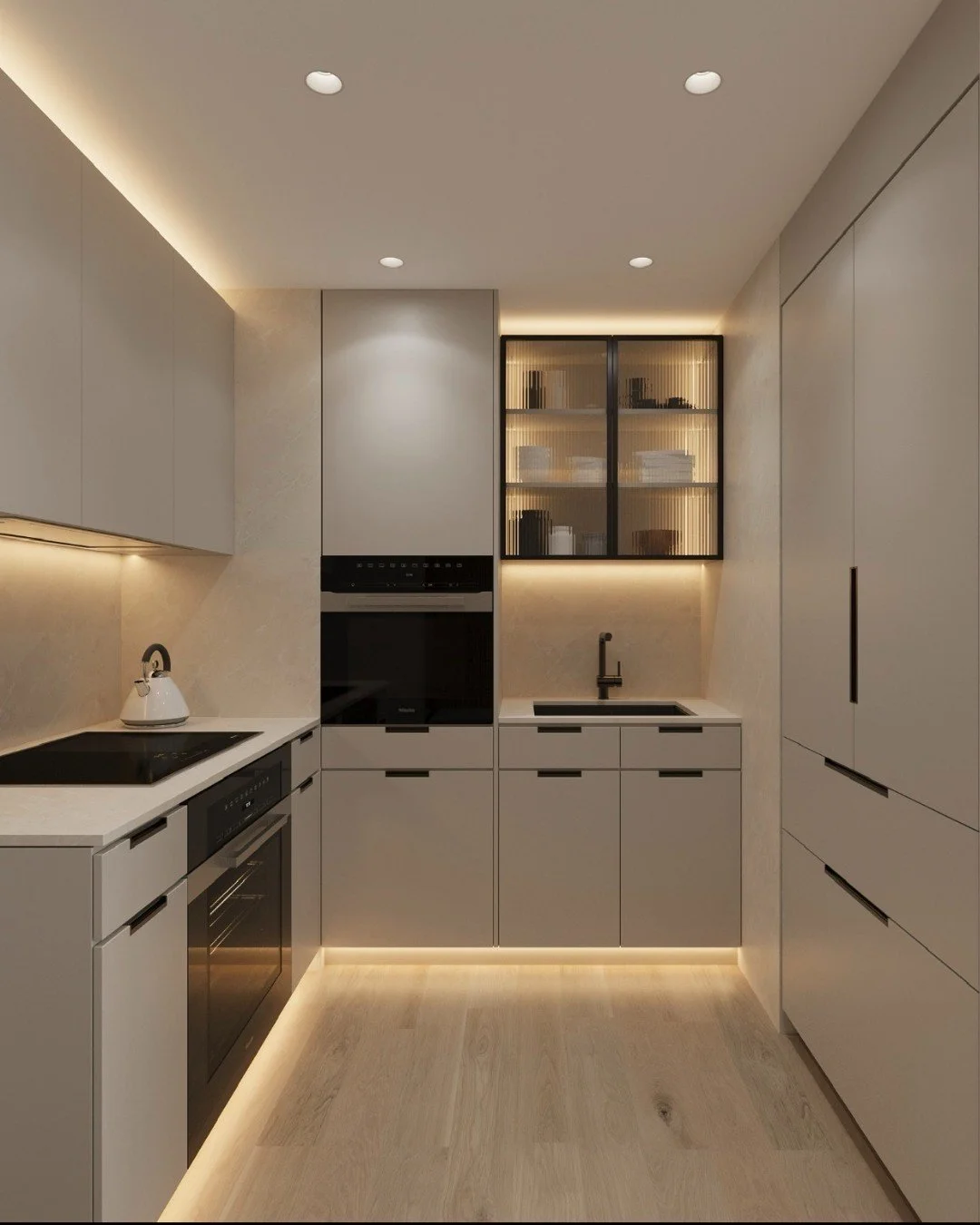 Small kitchen. Luxury mindset. ✨

Compact spaces don&rsquo;t mean compromising on the details. Integrated LED lighting, metal frame cabinetry with ribbed glass, black glass appliances, and soft grey millwork all come together to create a kitchen that