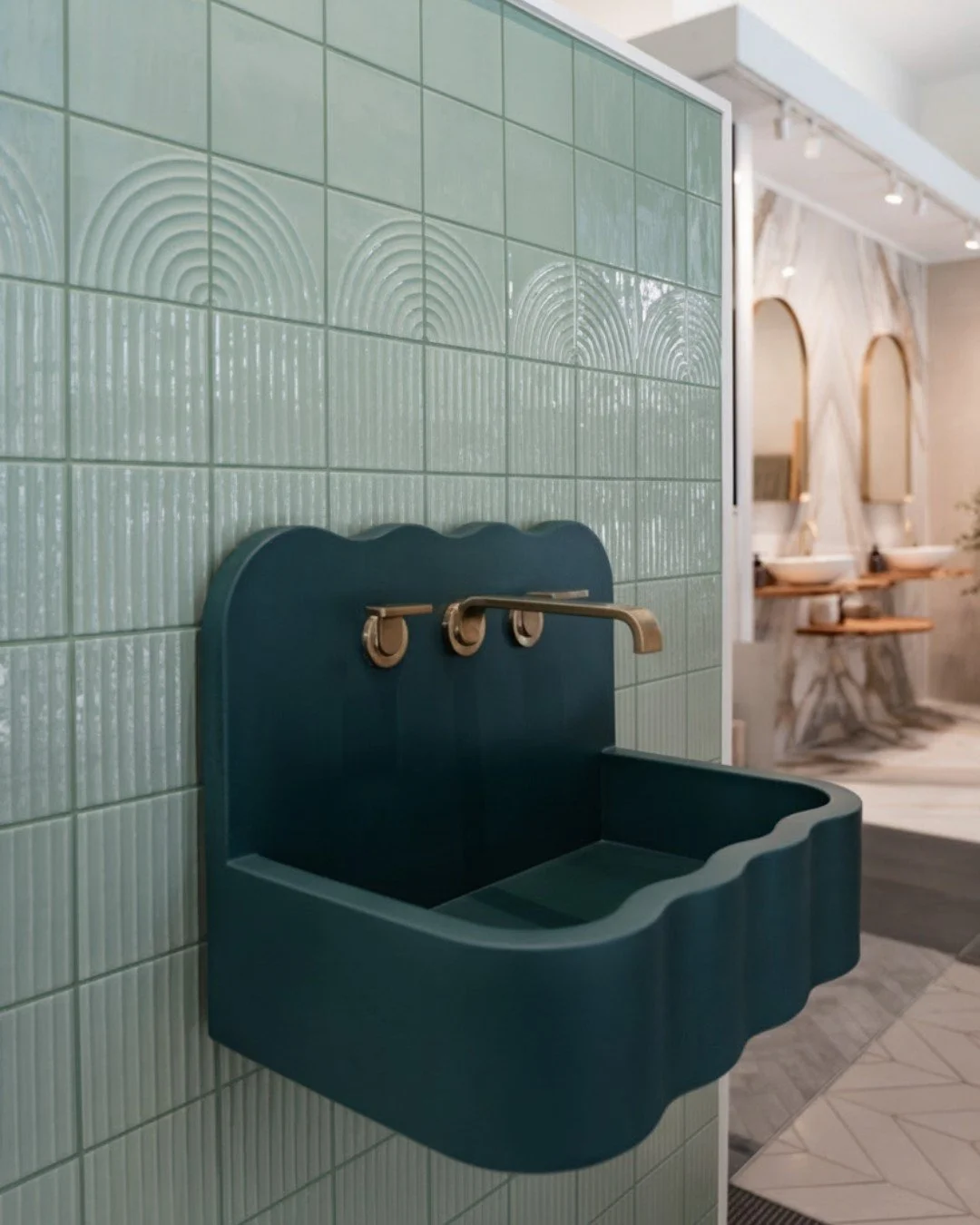 Curves have a way of making a space feel effortless....

In the bathroom, rounded silhouettes and soft architectural details help balance the structured nature of tile, stone, and cabinetry creating a more inviting, layered experience.
 
We&rsquo;re 