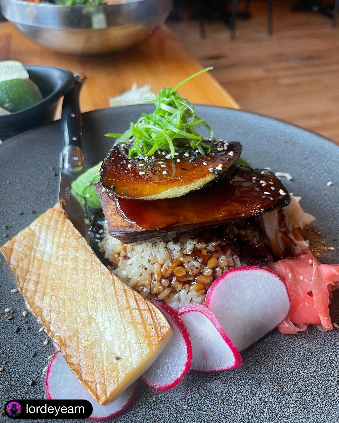 You won't believe THIS is eggplant! 🍆 Grilled &amp; glazed with Japanese BBQ sauce, served with smoked &amp; grilled 🍄 king trumpet mushroom, 🥑 avocado and house-made white kimchi on a bed of steamed rice &ndash; this #vegan dish will melt in your