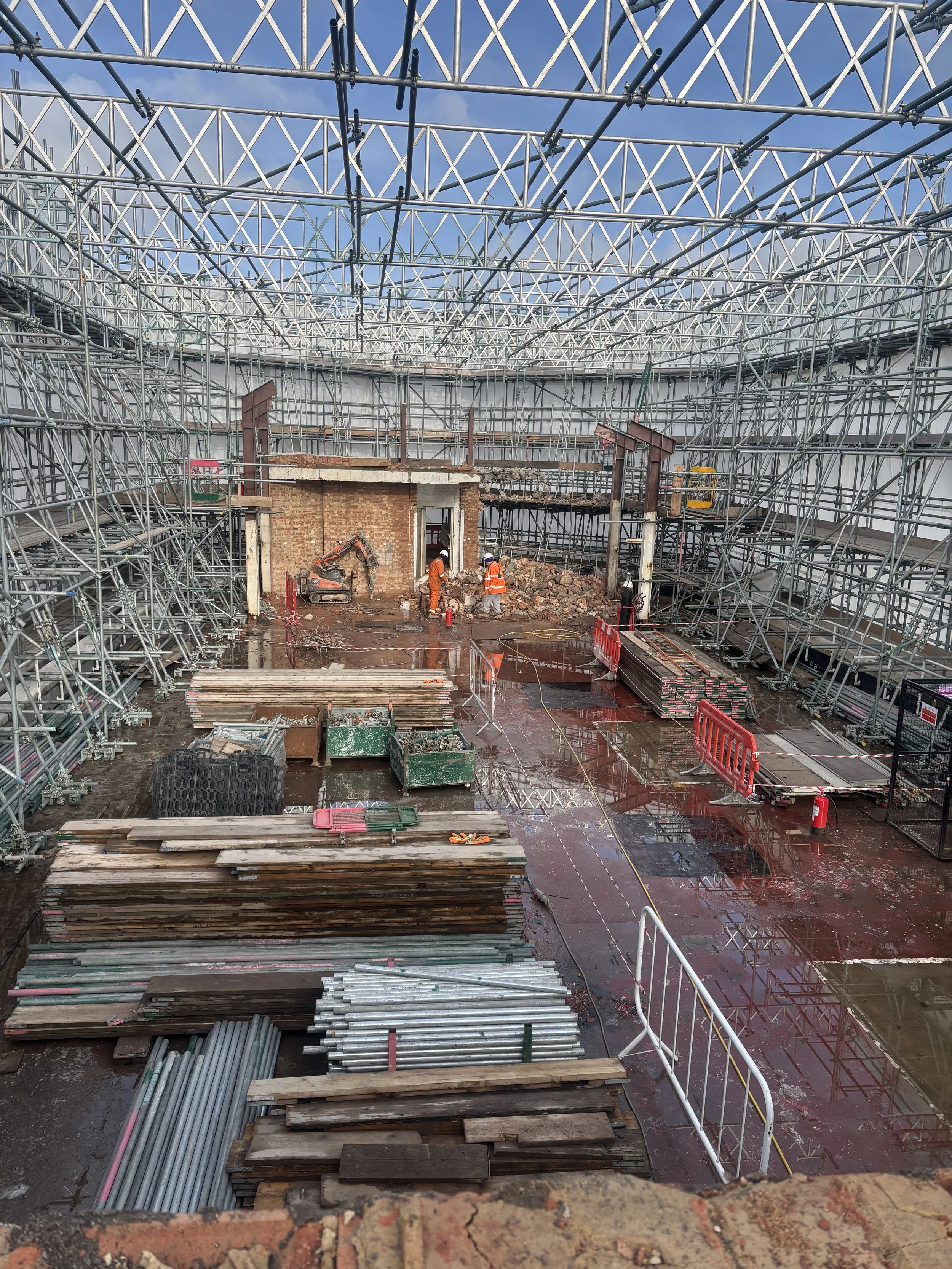 Scaffolding on a roof top installed during demolition work. 