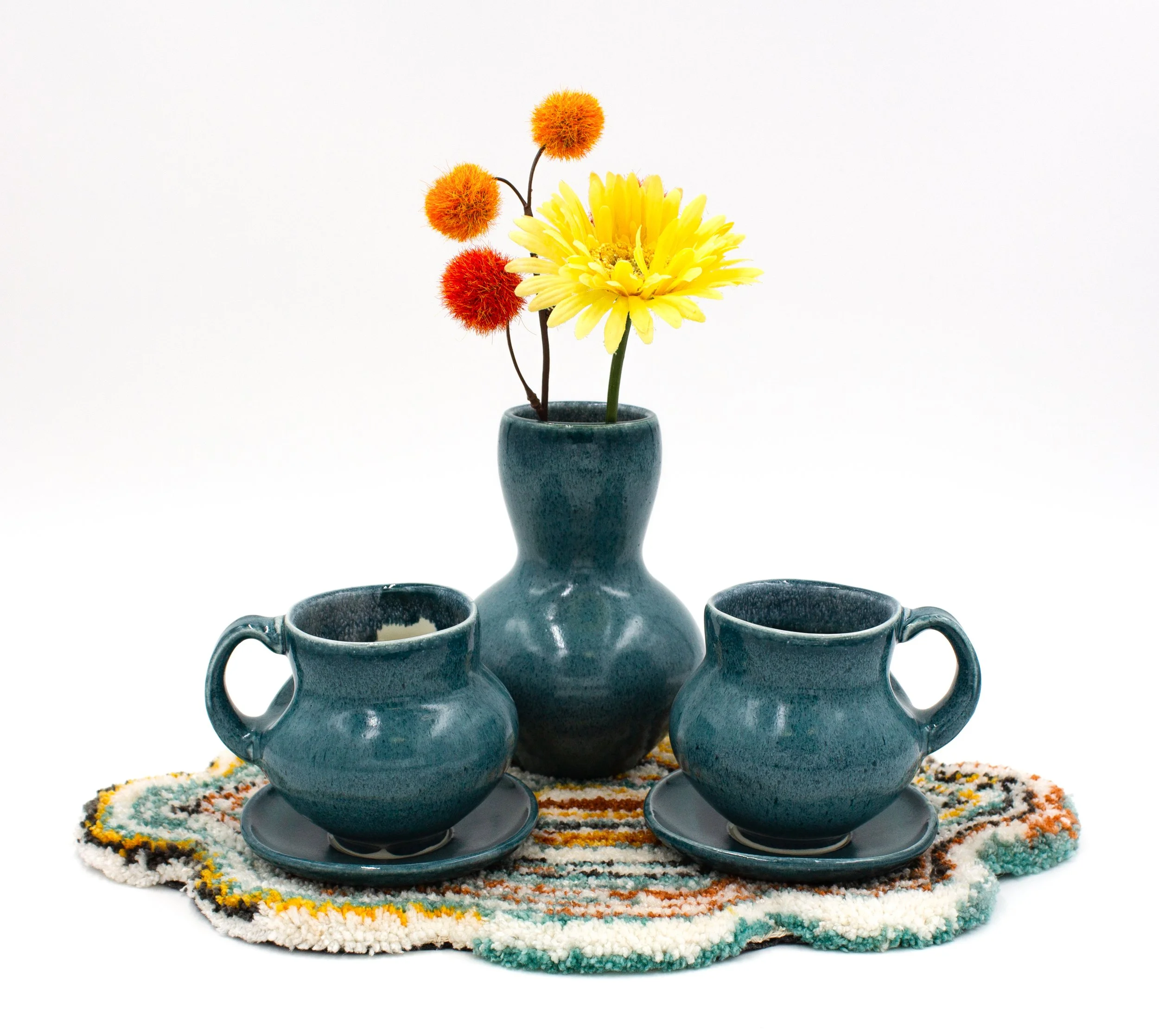 Mug Rug Set |
2023 |
Porcelain, Glaze, Yarn, Textiles