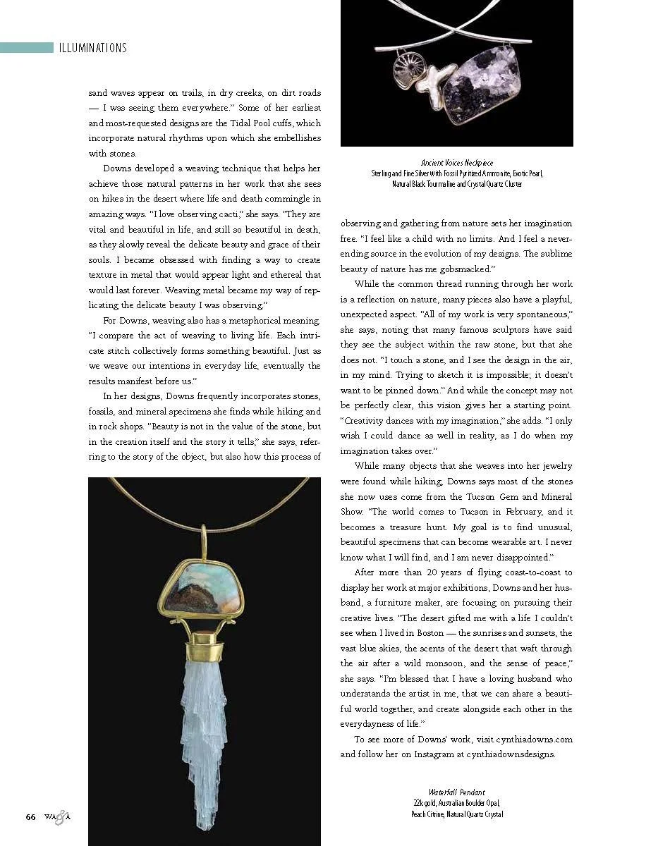 An image of an elegant pendant necklace featuring a rectangular piece of rough black tourmaline, a silver clasp, a small gear, and a clear crystal quartz cluster hanging from a gold setting. The necklace is displayed against a black background.