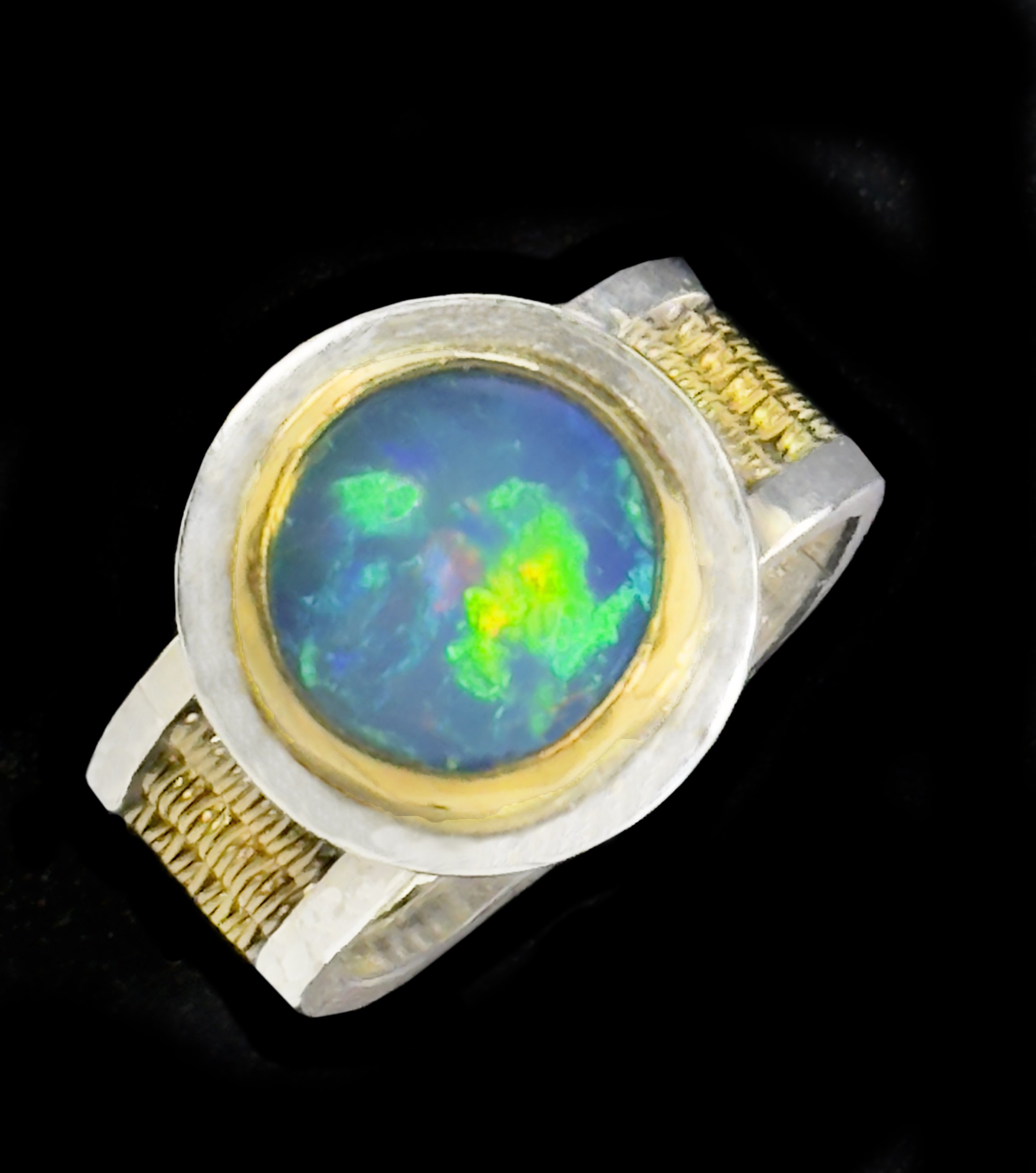 Downs,Cynthia_HandWovenRing_EthiopianOpal,22kGold,SterlingSilver_2500.jpg