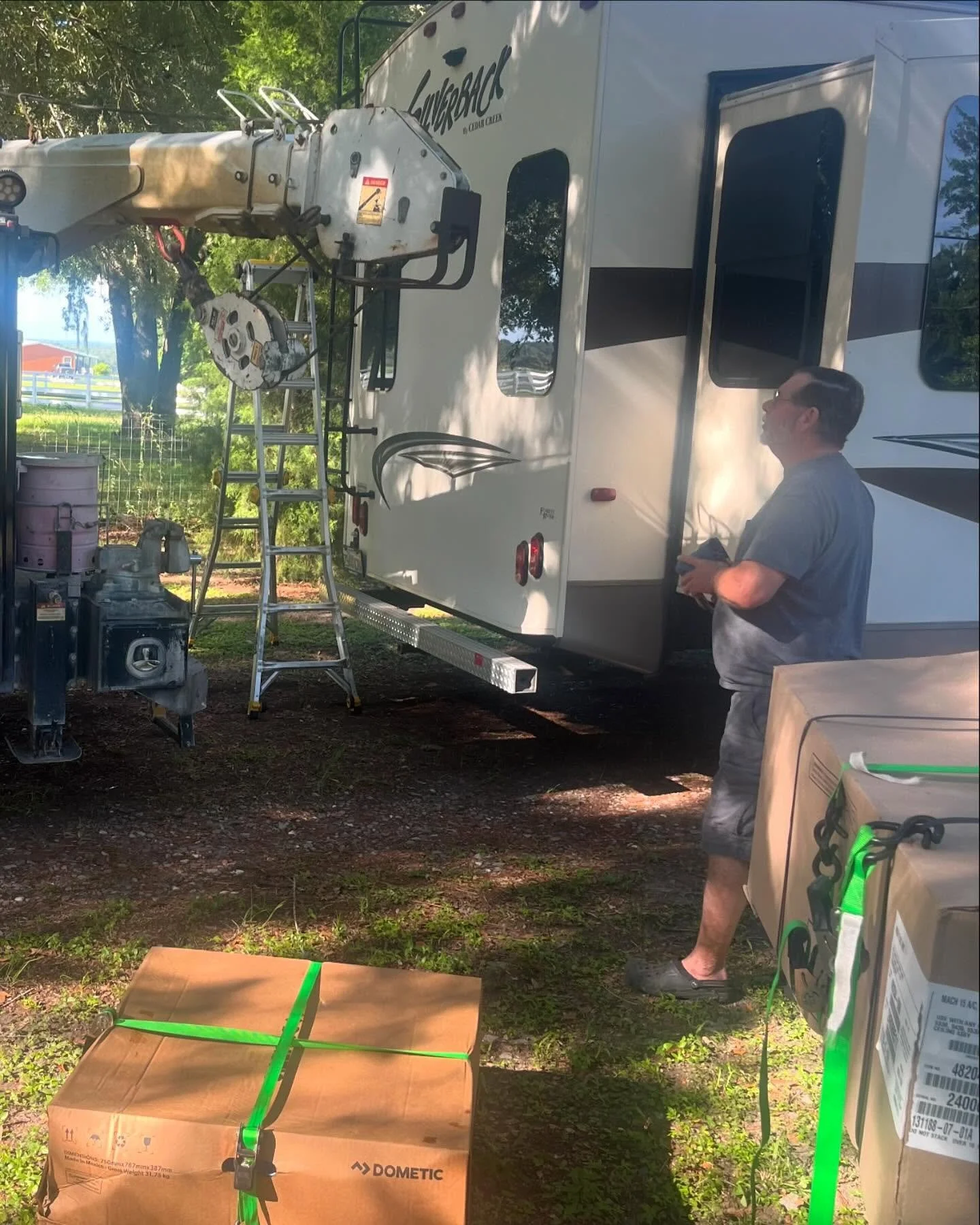 When your customer says he has a crane to get the AC units up on the roof, you take him up on the offer. Thanks Allen. #rvtech #rvairconditioner