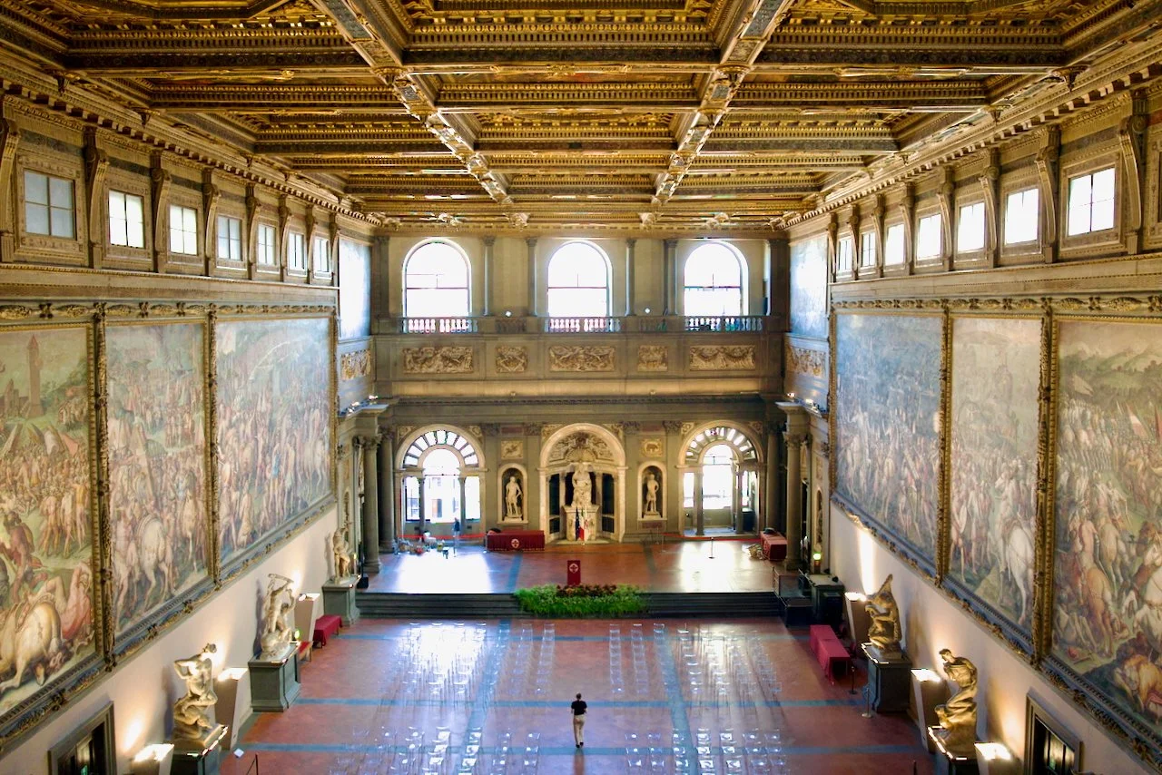 Huge room filled with paintings on the walls