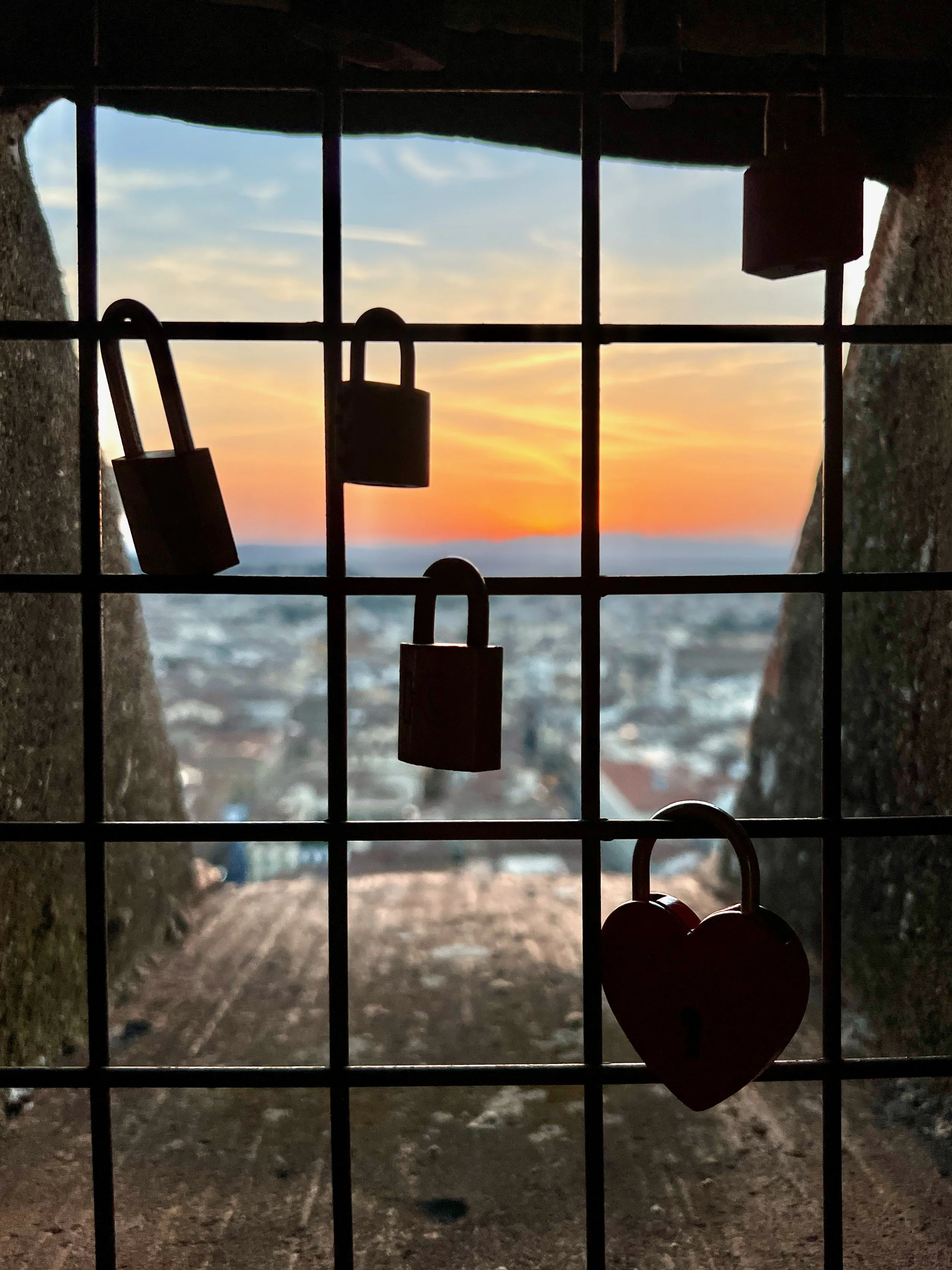 locks on a window inside the duomo