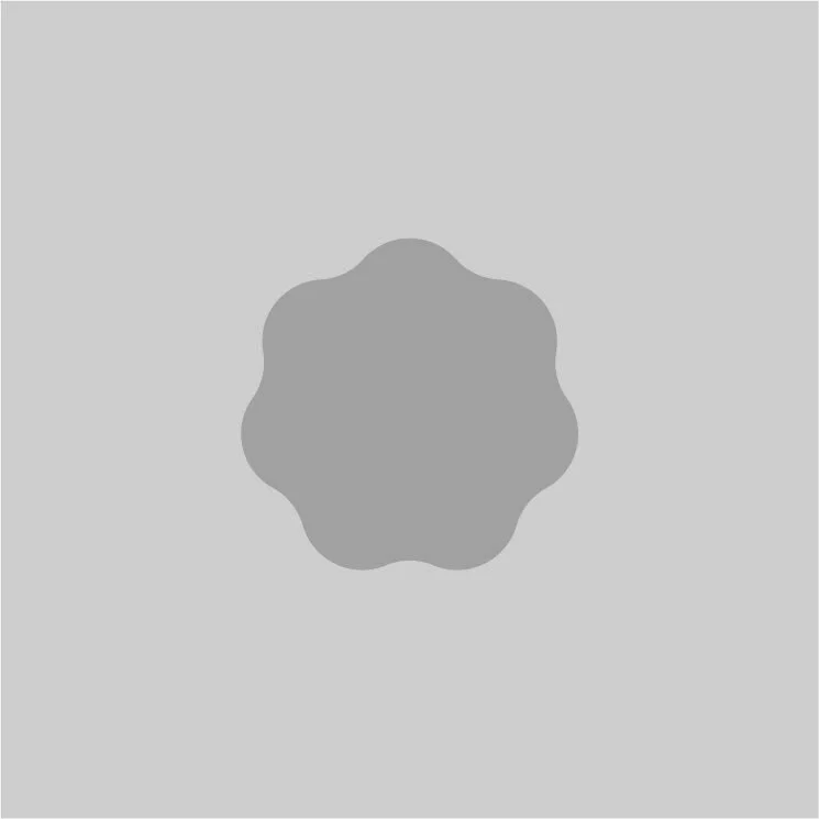 A gray background with a large, dark gray, irregularly-shaped object in the center.