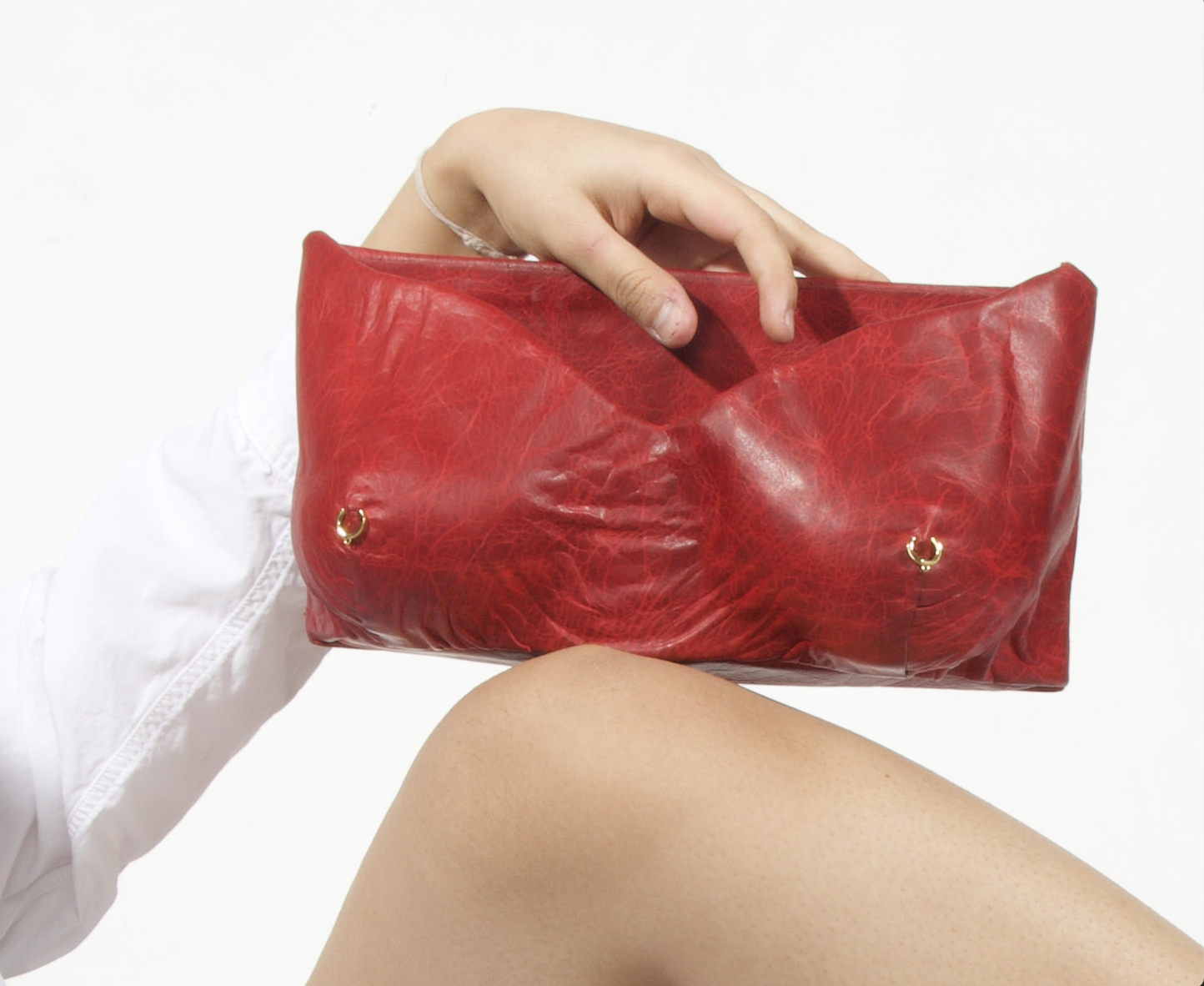 Clutch- Handmade cowhide distressed red dye leather with gold plated piercings