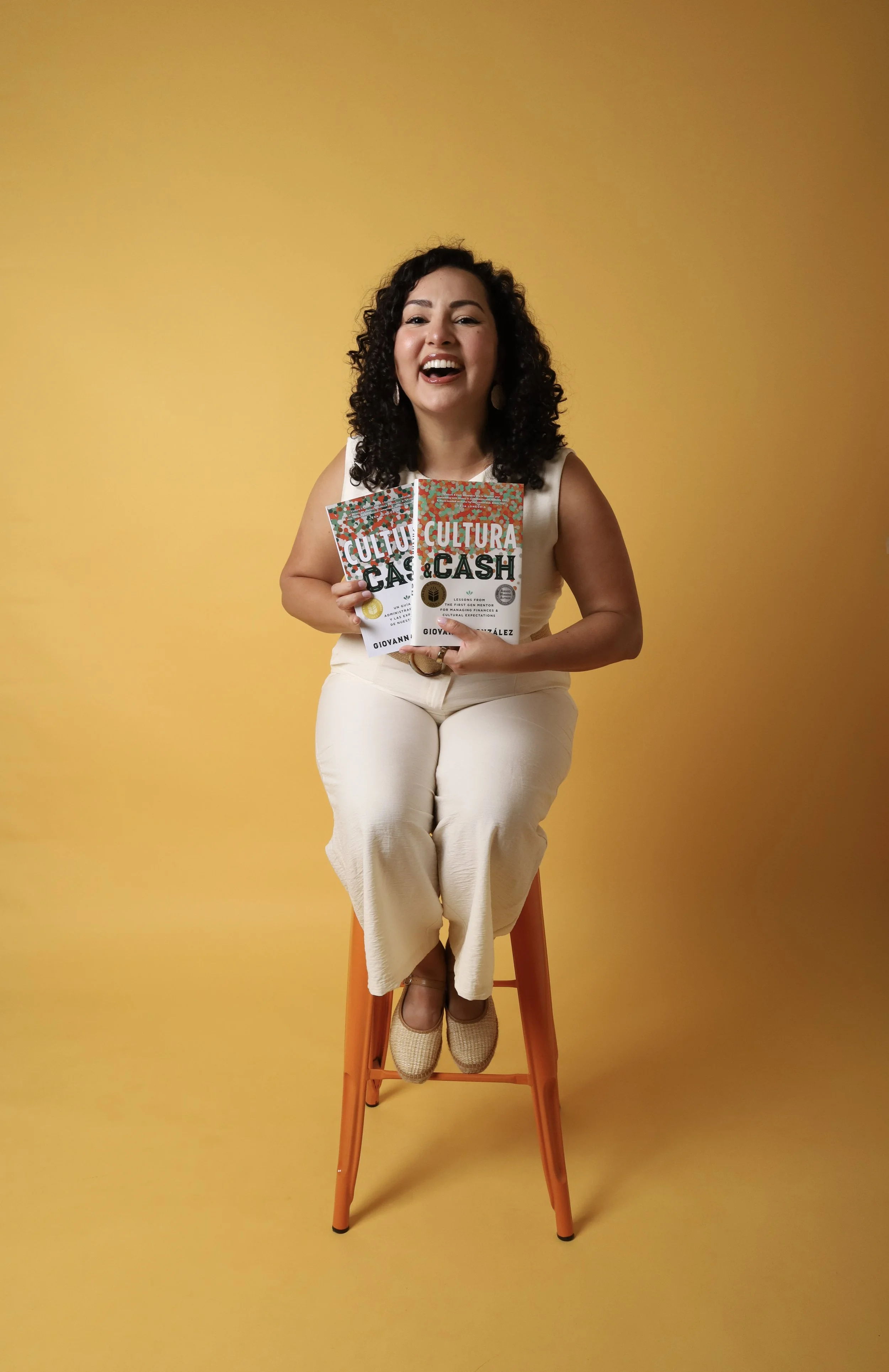 Giovanna Gonzalez pictured with English and Spanish book
