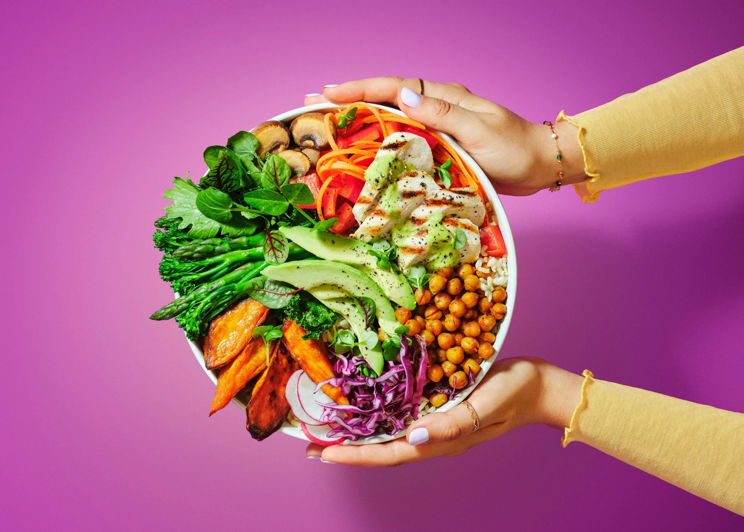 Top Sydney food Photographer Bonnie  Coumbe captured the latest Aus Veg ''Fresh veg, deliciously affordable'' latest ad campaign. Fresh vegetables in a bowl held in the hands and shot in modern bright bold lighting. 