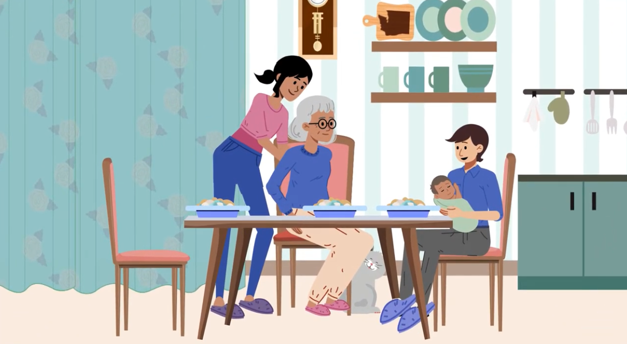 A woman takes care of her elderly mother in the kitchen with her children