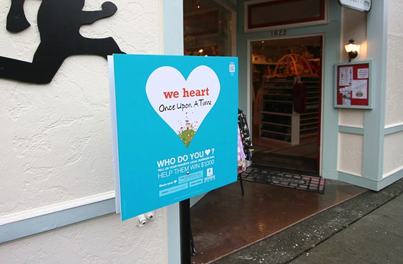 Partner businesses posted signs encouraging customers to vote for them.