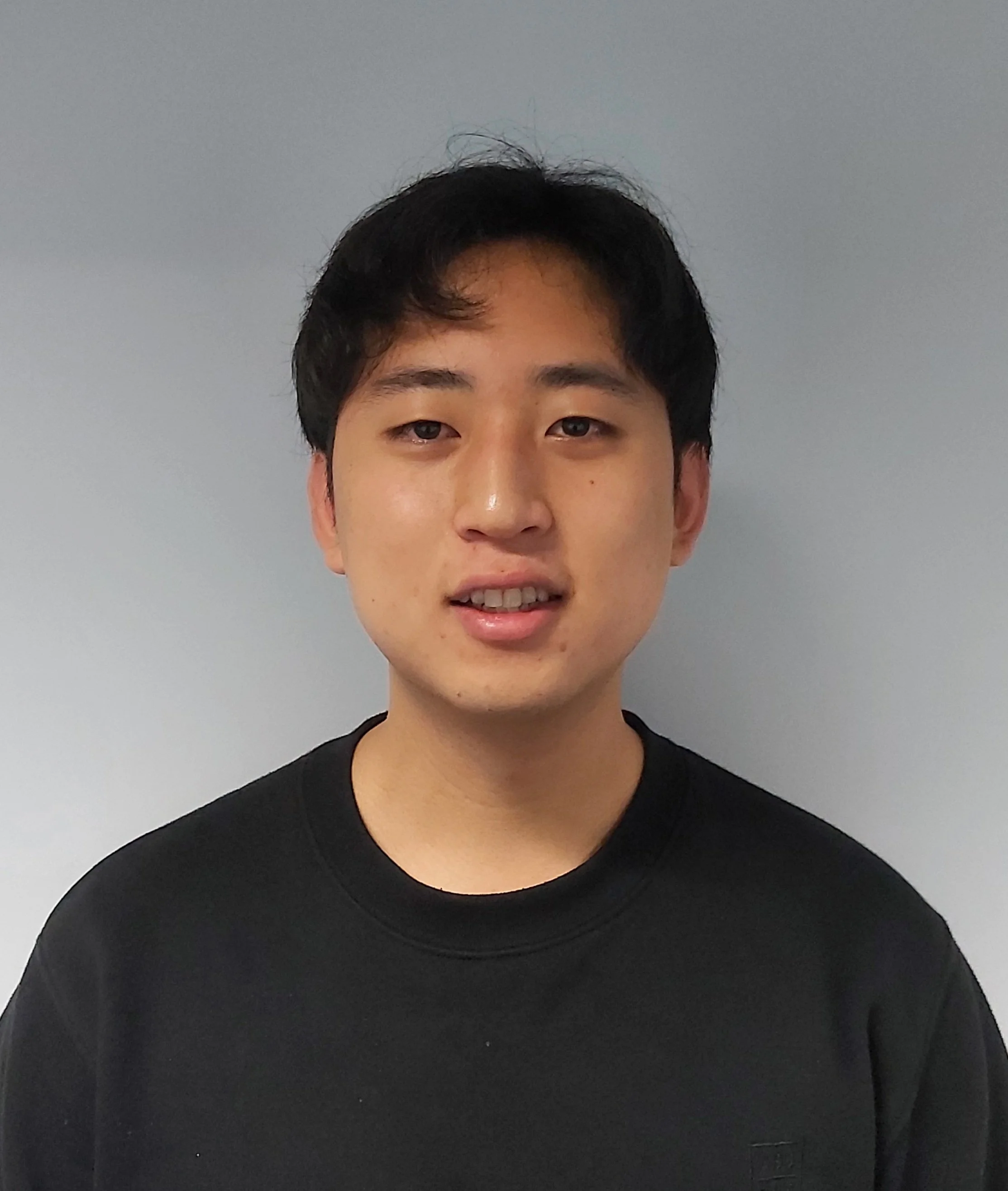 best maths and physics tutor in Auckland in a photo. Eric cell tuition.