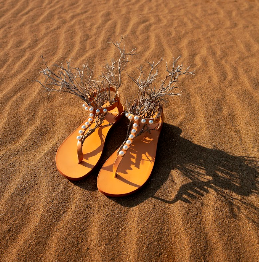 Discover the basics of the fundamental style of authentic Greek sandals and how to wear them