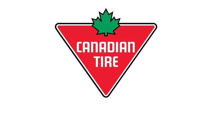 Canadian Tire logo featuring a red triangle with a green maple leaf on top.
