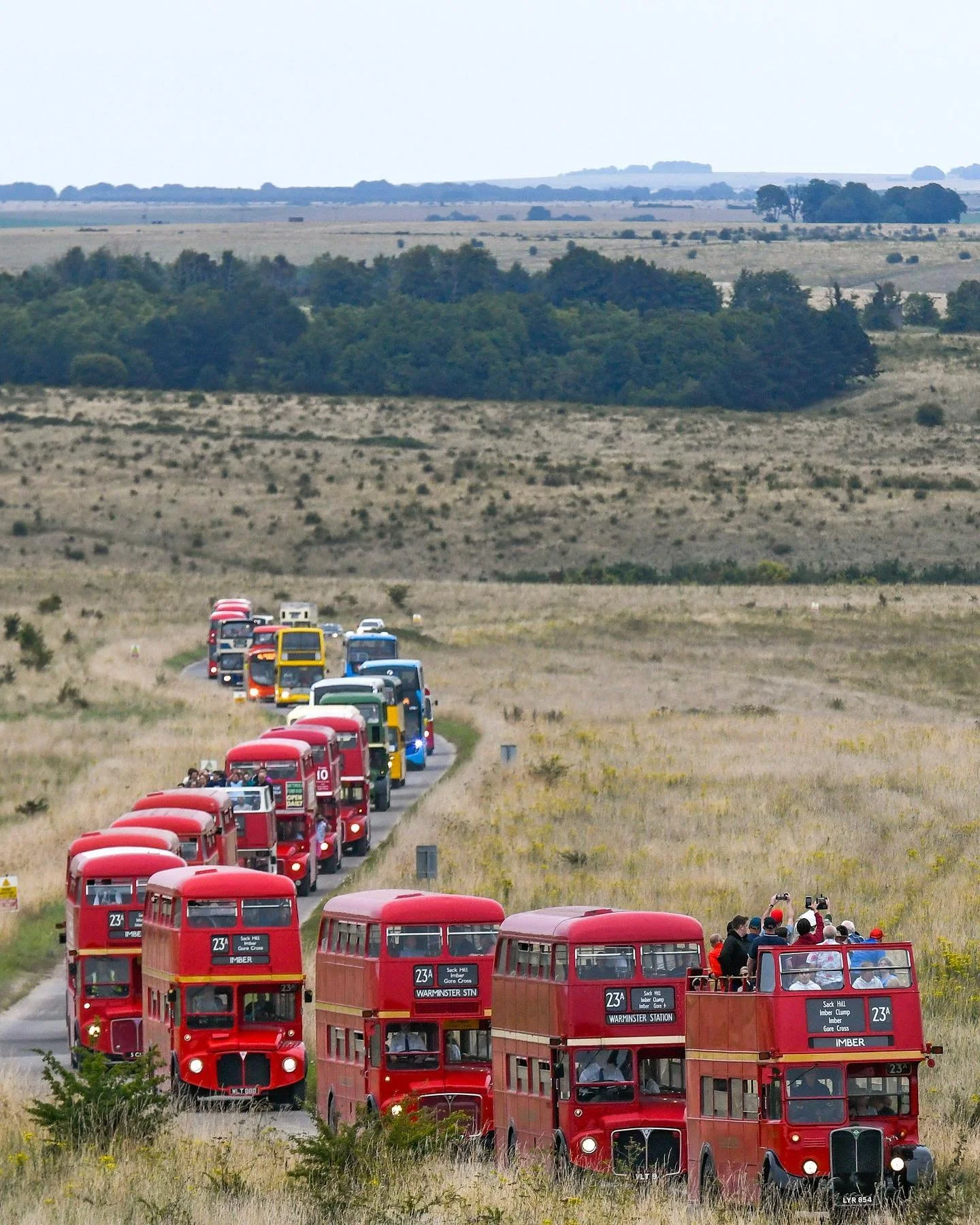 A cavalcade of over 40 classic and refurbished buses originating from various areas of the UK make their way across the Salisbury Plains, Wilts.
The procession was the final trip from the abandoned village of Imber to Westminster as part of the annu