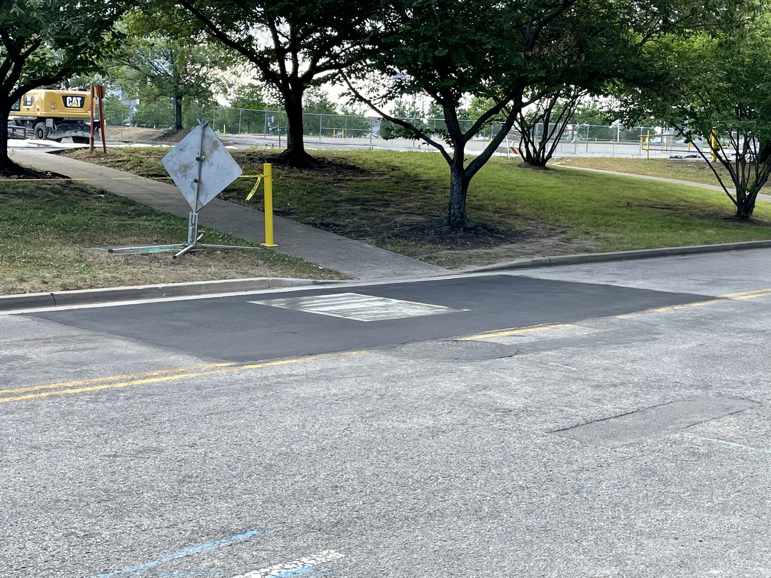 An asphalt pavement patch in Nashville, TN paved by Sessions Paving Company