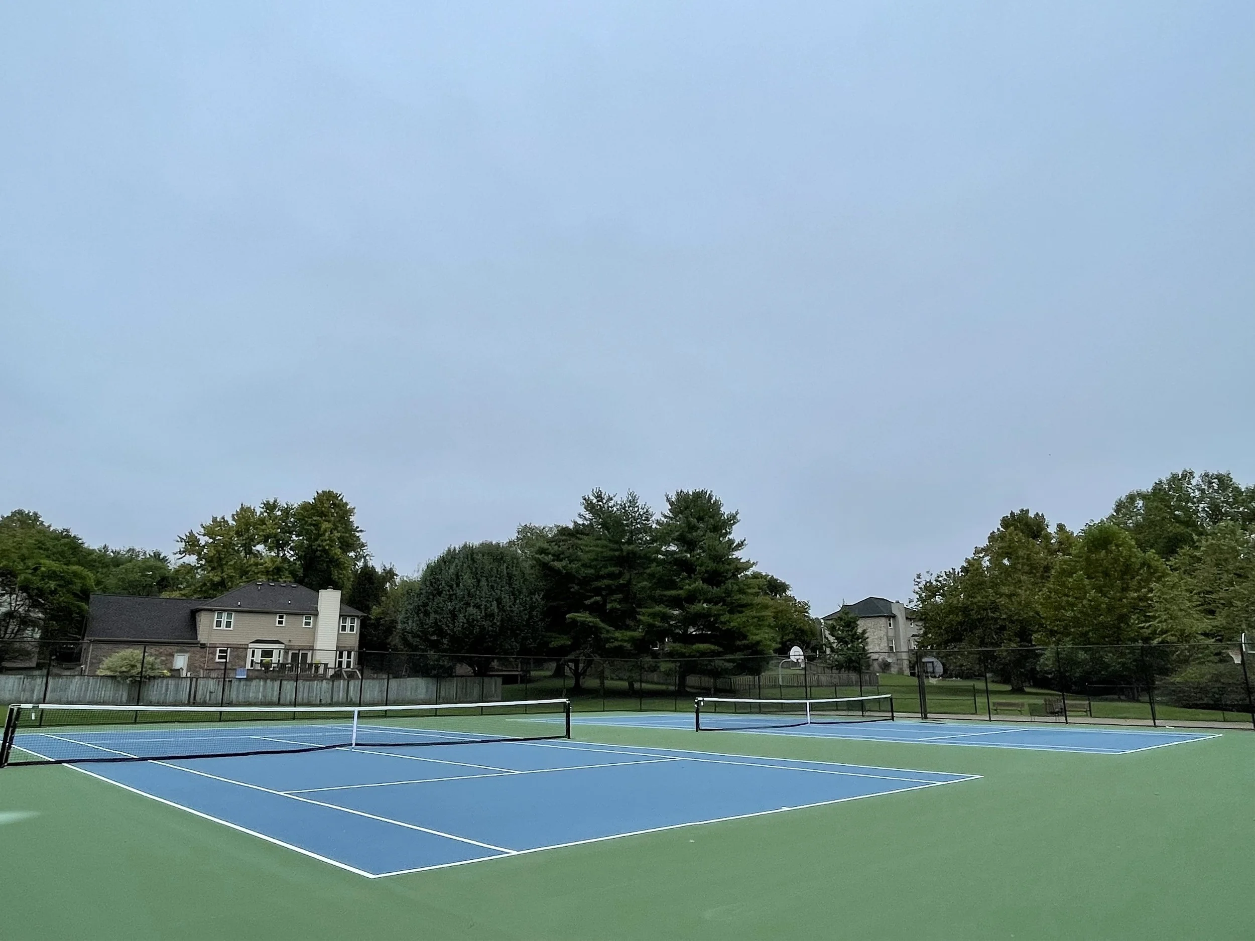 Paving, Repairs, and Asphalt Resurfacing, Restriping, and coloring of tennis courts in Franklin Tennessee for the Laurelbrooke community in Williamson County TN including tennis court nets, tennis court coloring, tennis court surfacing, and leveling