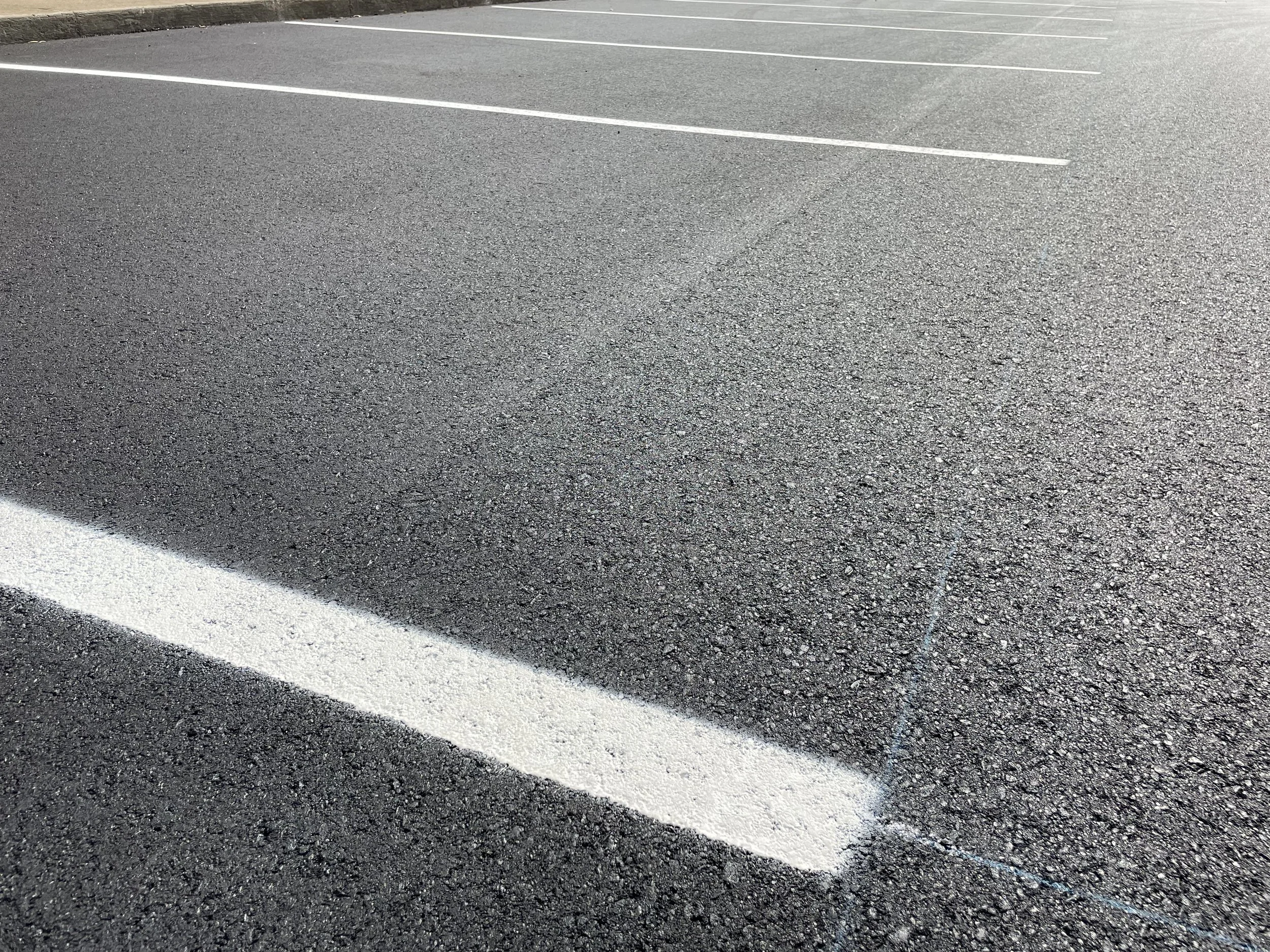 Parking Lot asphalt with painted pavement markings