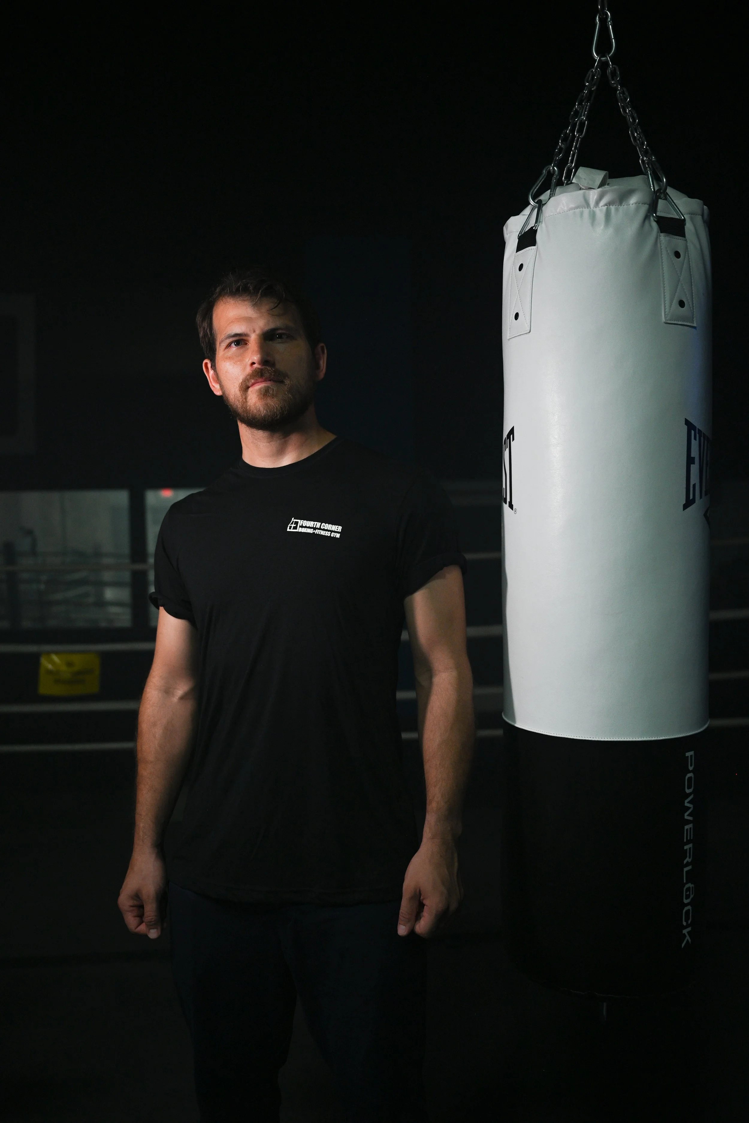 Coach Damien with Heavybag