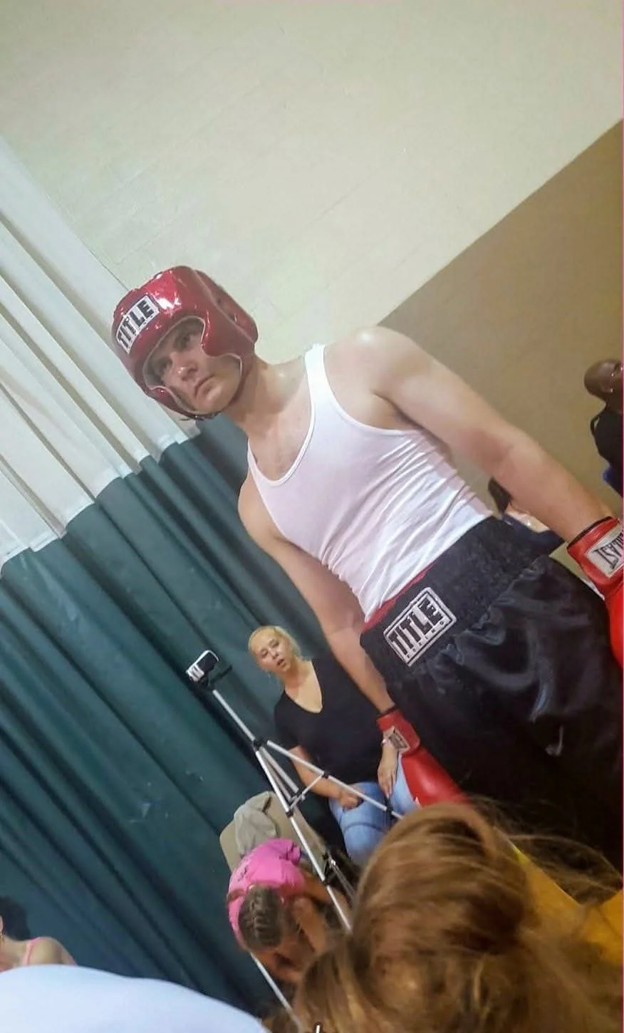 Coach Damien geared up for a boxing match