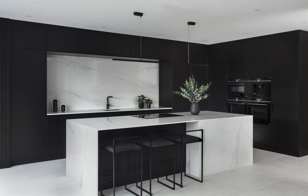 Black handless contemporary kitchen. On display in our Belfast showroom ...