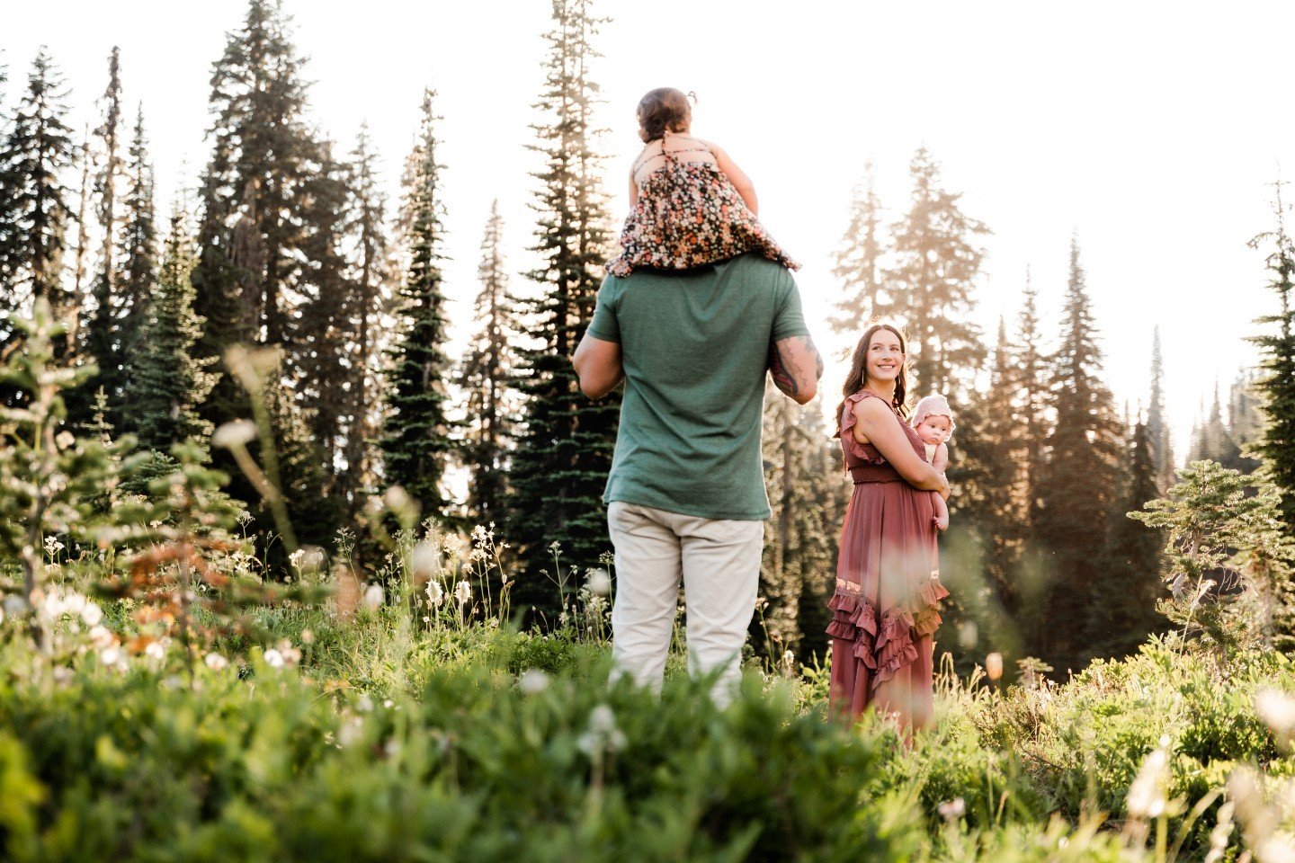 Spring is a time to say goodbye to the dead and dreary and welcome more sunlight, warmth and of course, flowers! 
I highly recommend a spring or summer family portrait session because you have better weather, usually more flexibility, you&rsquo;re ge