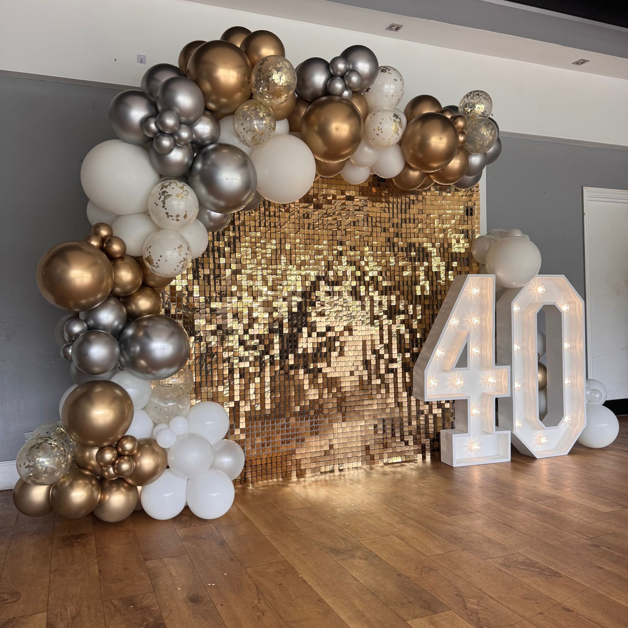 Gold sequin wall and balloon arch Hertfordshire London Cambridge